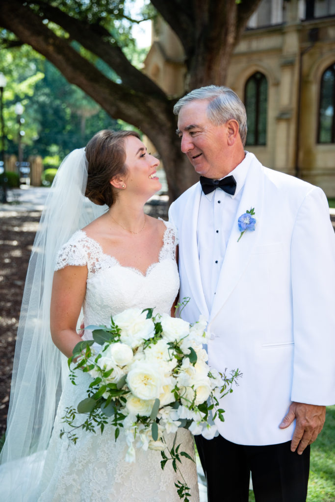 Father of the bride Peter Fawcett shares a very special moment with Margaret Deans in the church courtyard. 