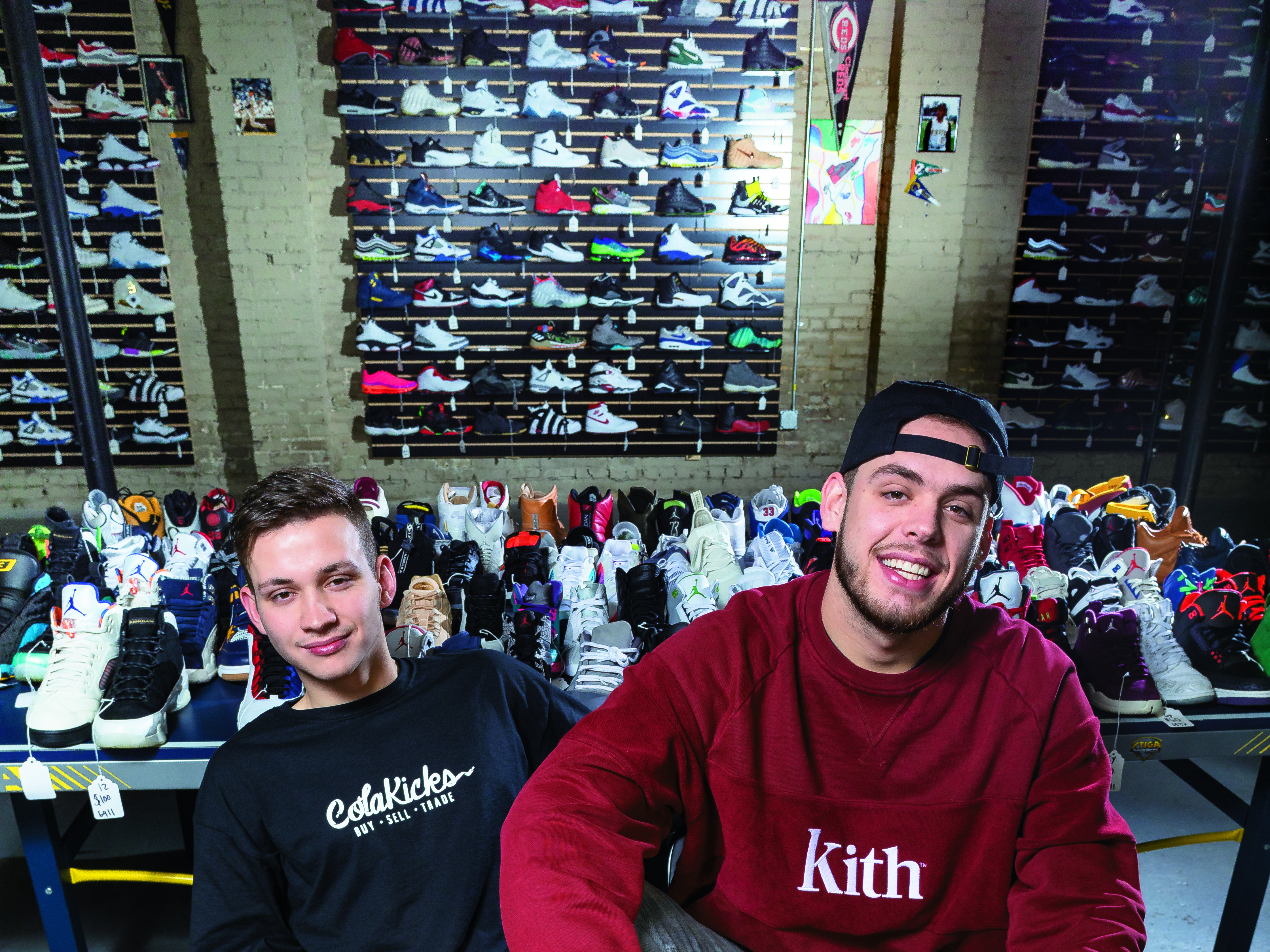 Former USC roommates Josh Kilgore and Adam Patrick relax while telling their story of opening ColaKicks in Five Points. The business model focuses on buying gently used, in-demand sneakers and selling them for a fraction of the original cost. 
