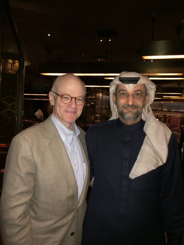 William with the Saudi Arabian Minister of Justice’s aide-de-camp following a meeting with Saudi government officials in 2015. 
