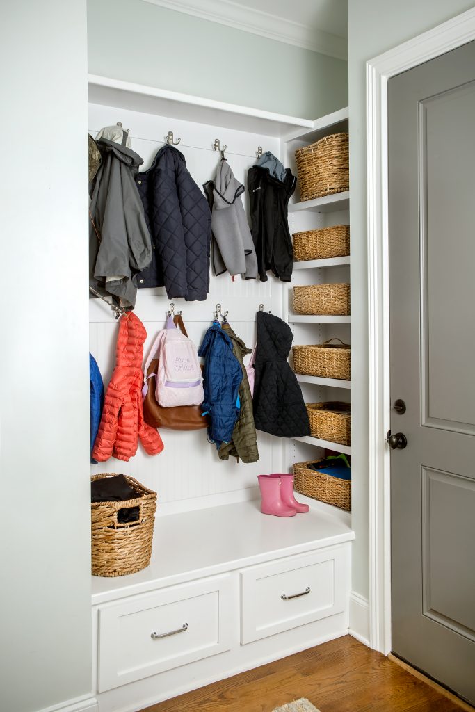 Alle Kaneft uses the mudroom beside her laundry area for easy access to coats, backpacks, and shoes.
