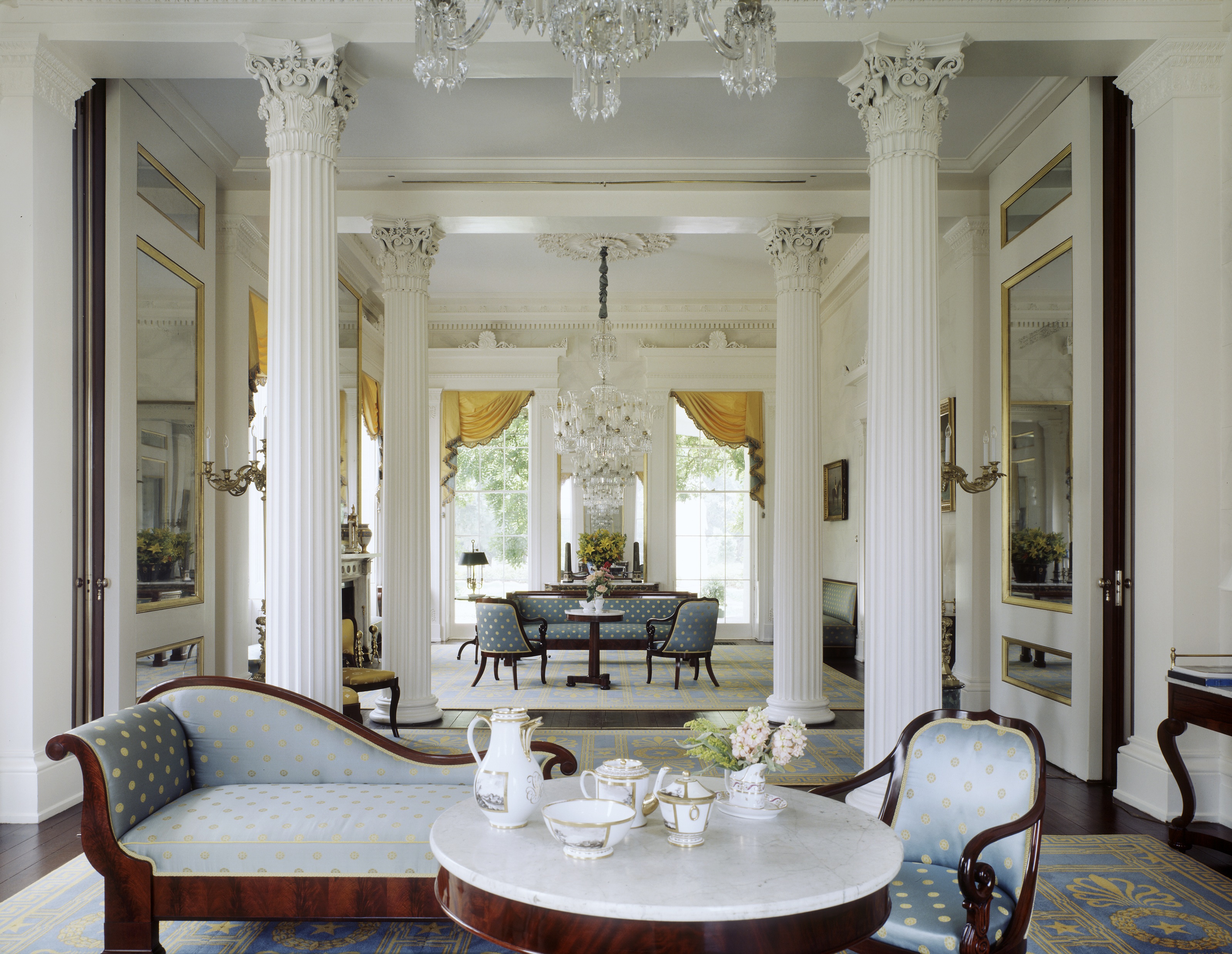 The double parlors are separated by a screen of Corinthian columns and feature almost exclusively Duncan Phyfe furniture commissioned by the Mannings.
