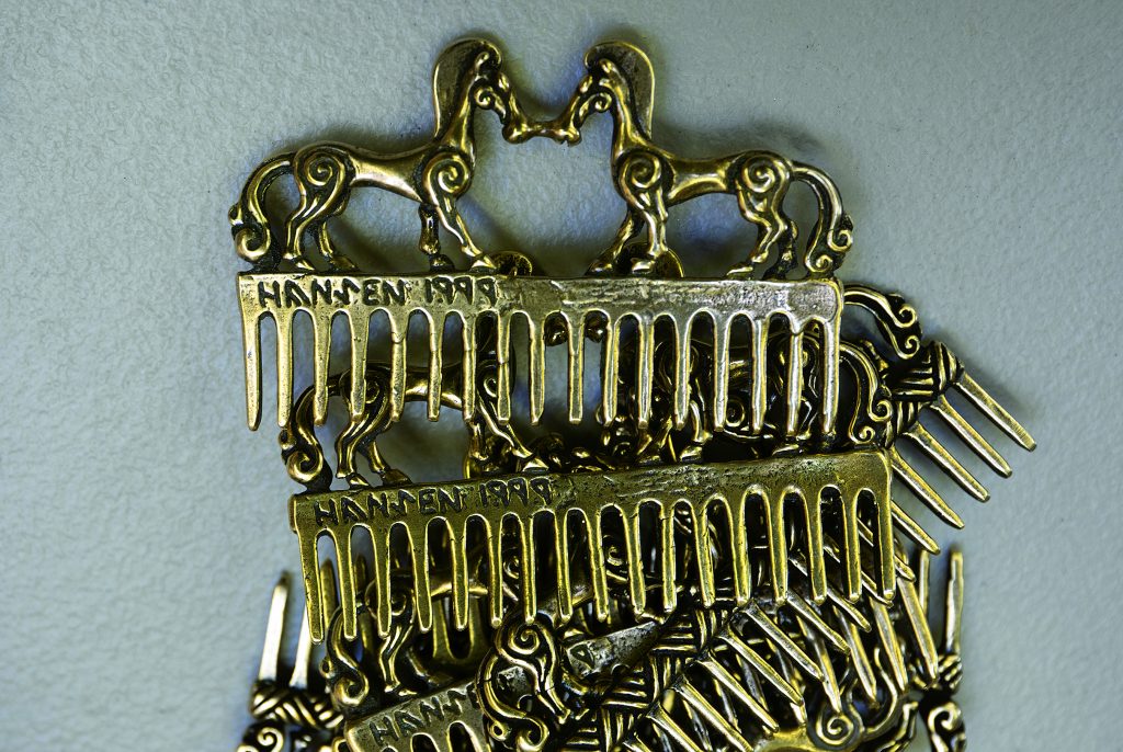 Bronze combs, inspired by Scythian grave finds.