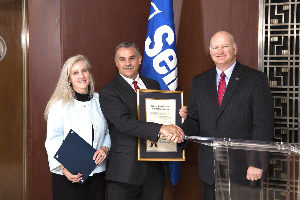 In 2018, Secretary of State Mark Hammond recognized Seibels as a South Carolina Centennial Business. Left to right: Jane Huggins, Rex Huggins, Secretary of State Mark Hammond
