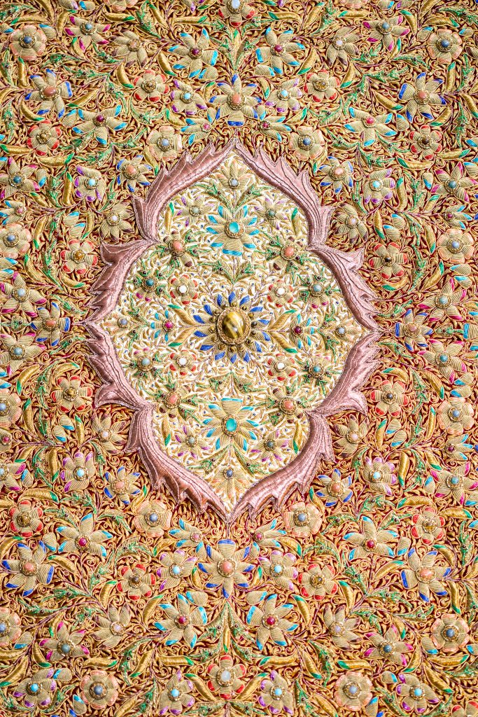 These Indian rugs are made of semi-precious stones and copper thread.