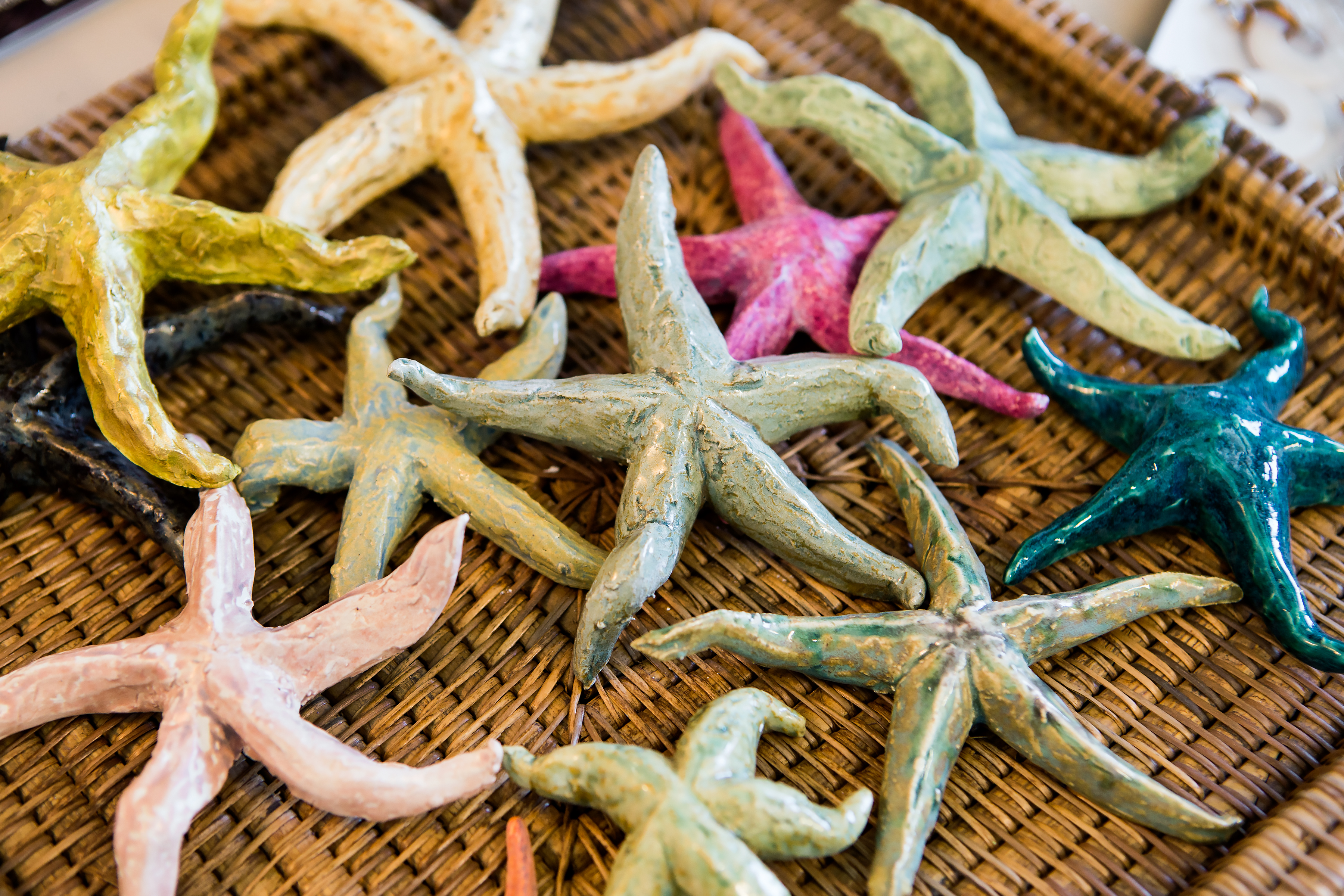 The basket of colorful clay starfish rests on Pat Gilmartin’s desk upon entering her new space at Stormwater Studios on Pendleton Street.