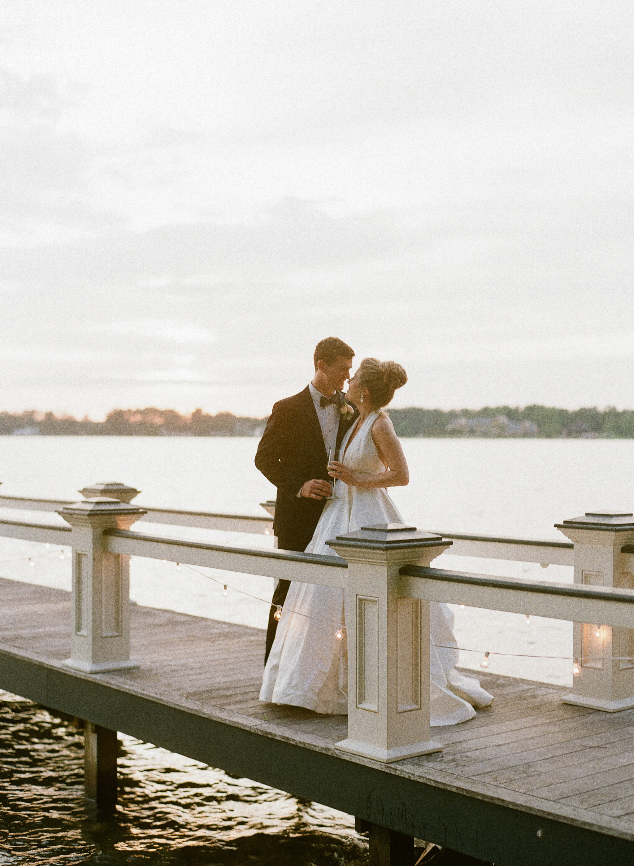 A beautiful Lake Murray sunset was the backdrop for Erin and Billy Padula’s reception at Erin’s family home. The Westerkams’ majestic and picturesque location on the water and under the stars provided Erin’s dream, a casual yet elegant ambiance.
