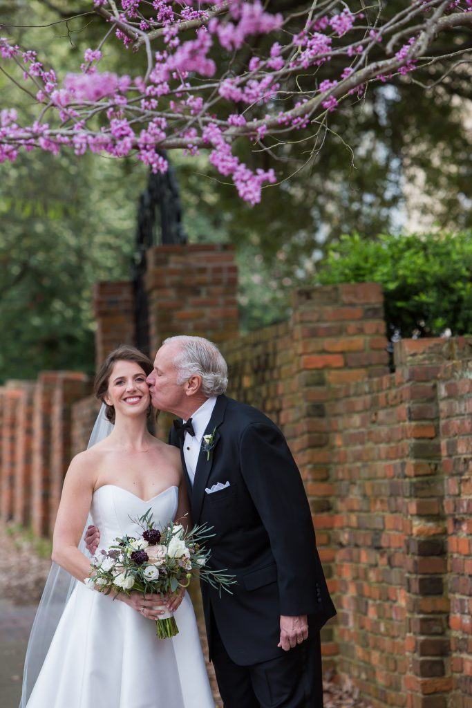 During a special moment minutes before the ceremony, Mary Rogers and her father, Gov. Henry McMaster, listen for their musical cue to walk down the aisle. 