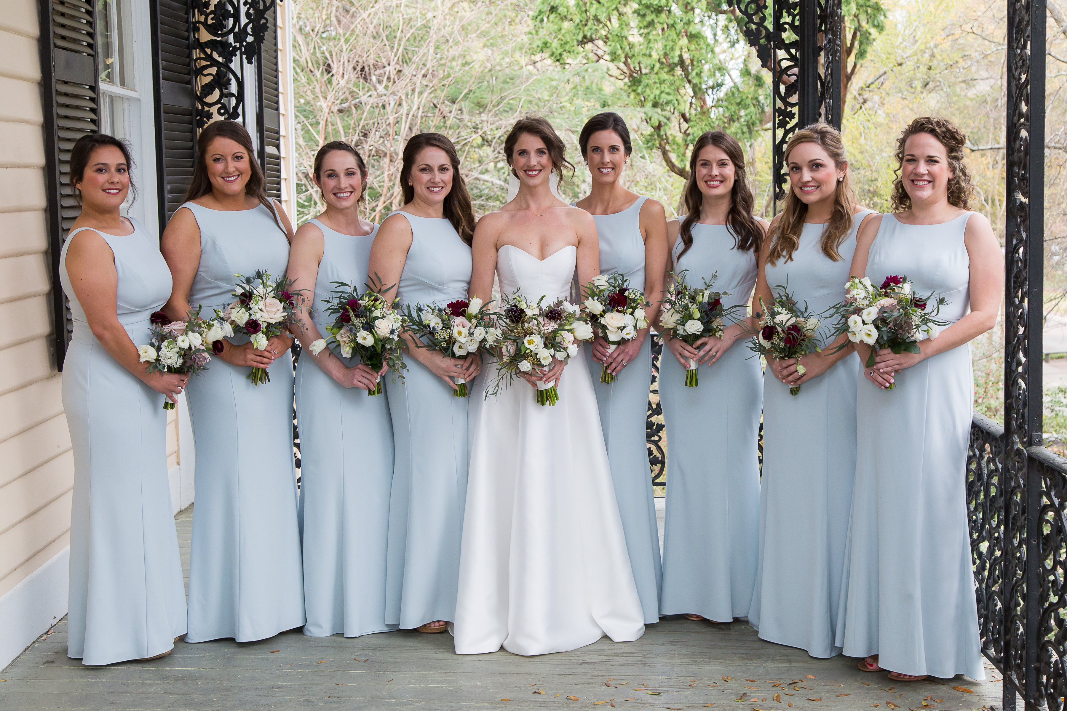  The bridesmaids assembled on the porch of the Lace House just moments before heading to the ceremony. Celine Roustan, Allie Herskovitz, Sarah Fitz-Maurice, Katie Herskovitz, Mary Rogers McMaster Herskovitz, Virginia Roach McMaster, Emily Burgis, Paige Whalen, Lise Hensel. 