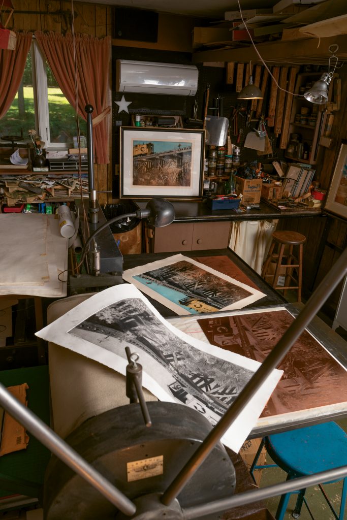 Boyd’s studio houses both an etching press and a lithograph press. “The Trestle” is Boyd’s most recent effort and is part of his series called The Return of the Wanderer. The engraving took more than a year to complete, and printing it is a major production. 