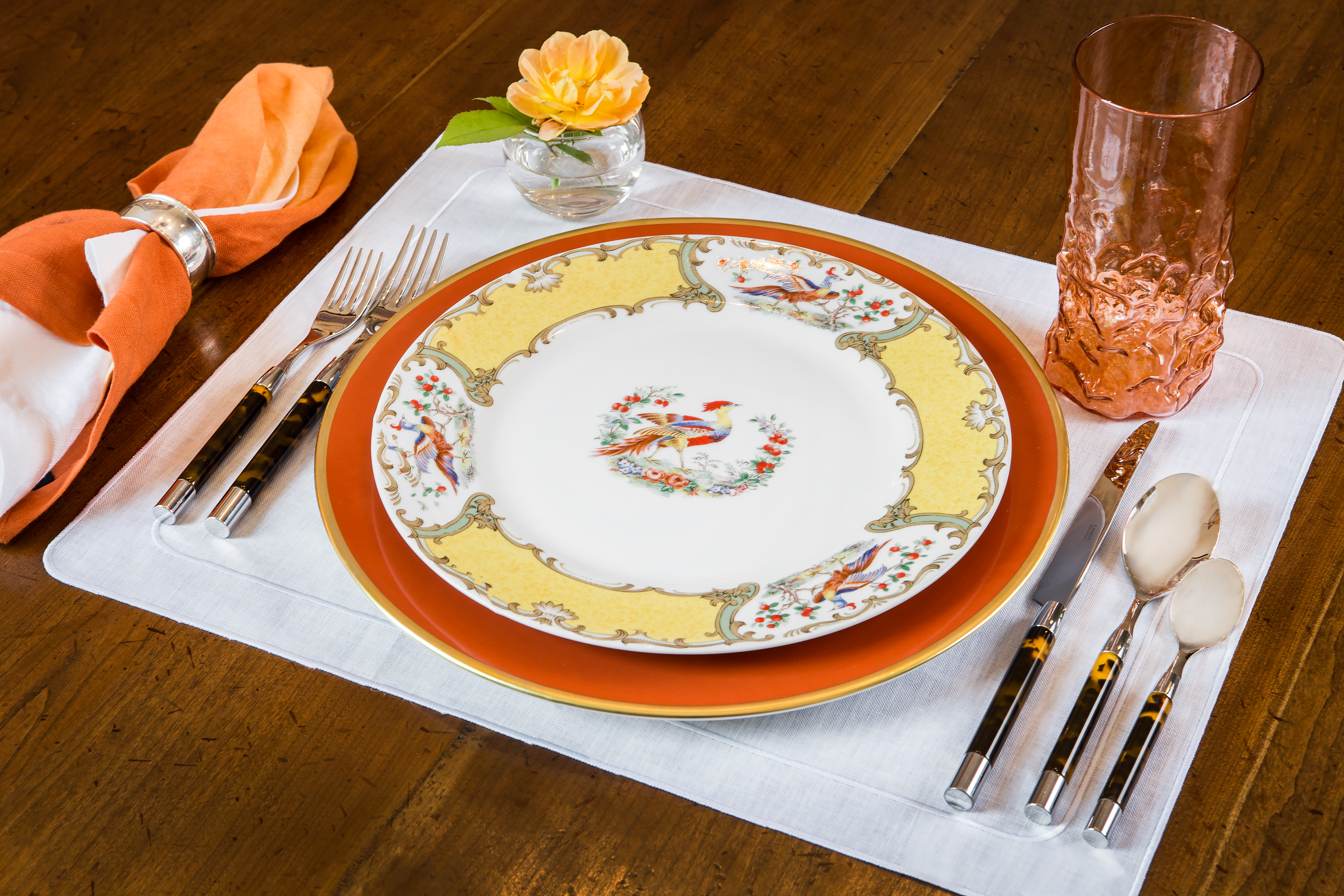 To set a swanky cocktail supper, add a modern Michael Aram Orange Dip Dye Napkin with Capdeco Conty Tortoise place setting from non(e)such. The yellow Andrea by Sadek dinner plate from a family collection is triumphant silhouetted on the blood orange charger from Anna Weatherley Designs, non(e)such. 