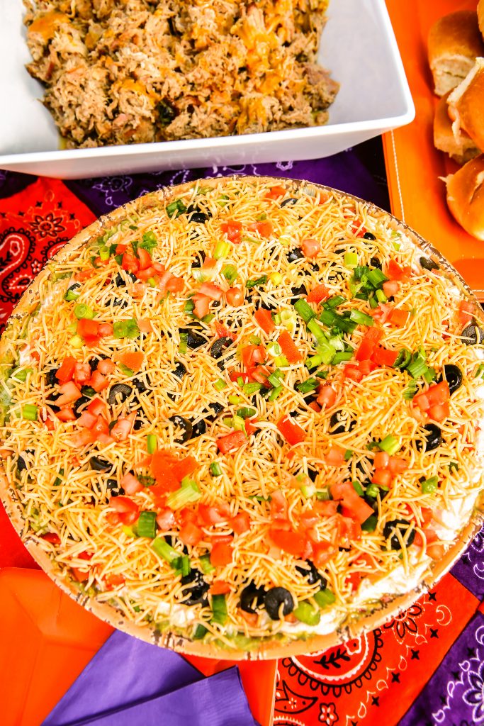 Southern Way Catering’s seven layer Tex Mex dip is a highlight for the Clemson orange theme.
