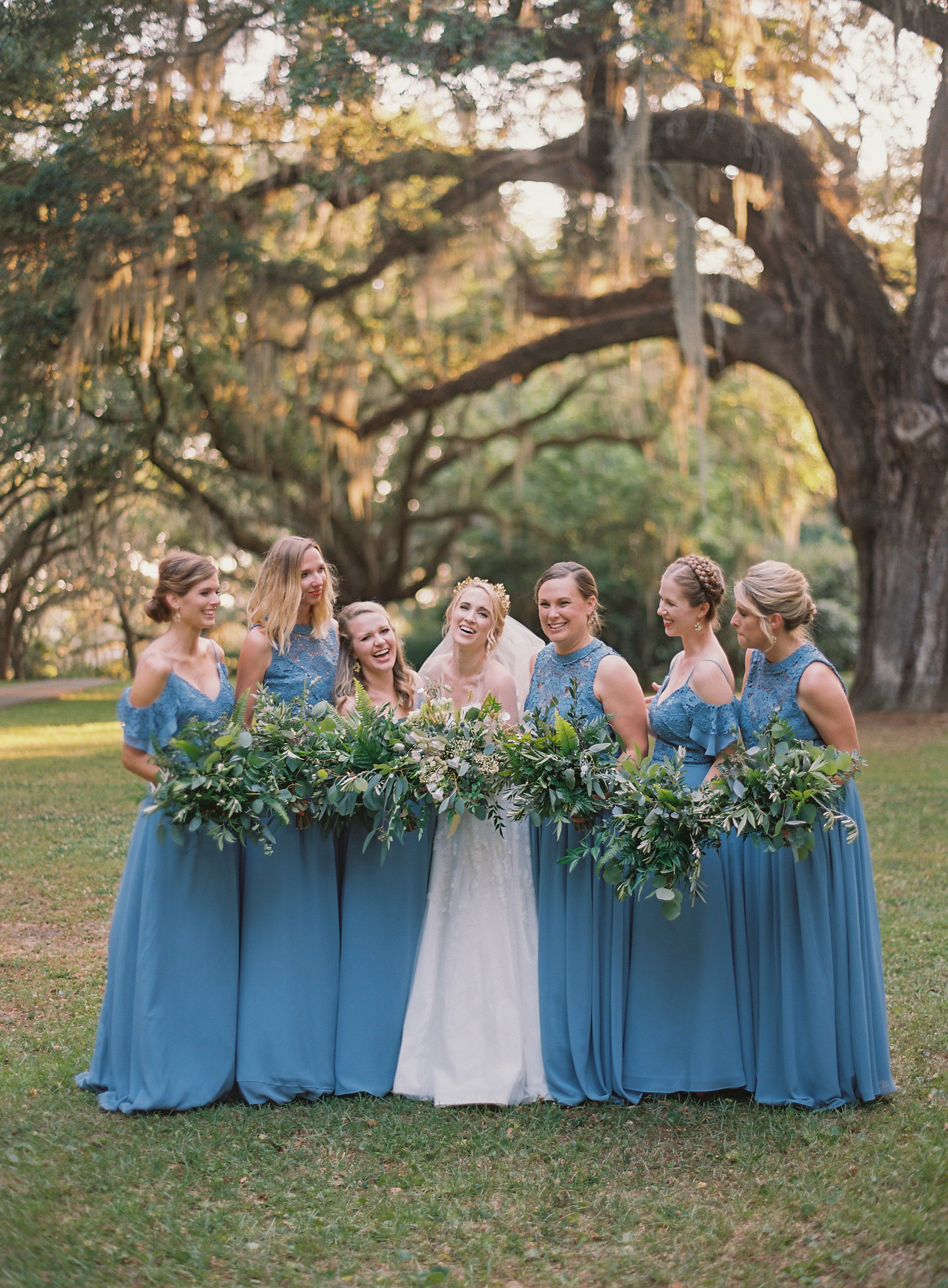Bridesmaids wore beautiful blue gowns complemented by botanical sprays, completing the theme of French blue and greenery. Christine McFadden, Ieva Garenne, Jessica Phillips Tyson, Lauren Garenne, Mary Mac Wilson, Meredith Wallis, and Caitlyn Fowles.