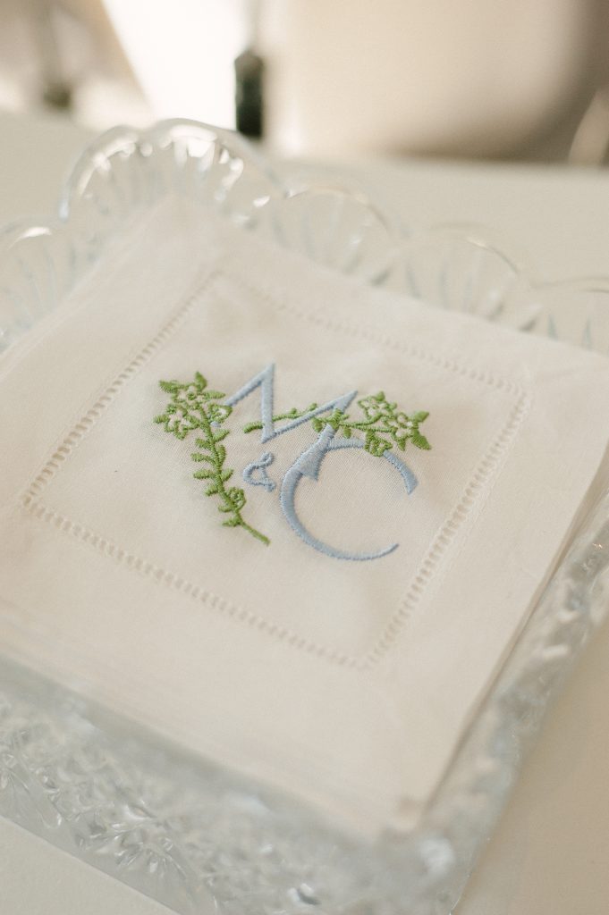 Artist Caroline Connell from Richmond designed the wedding monogram used throughout the weekend. Hemstitched linen napkins gave each guest a special remembrance of the reception. 