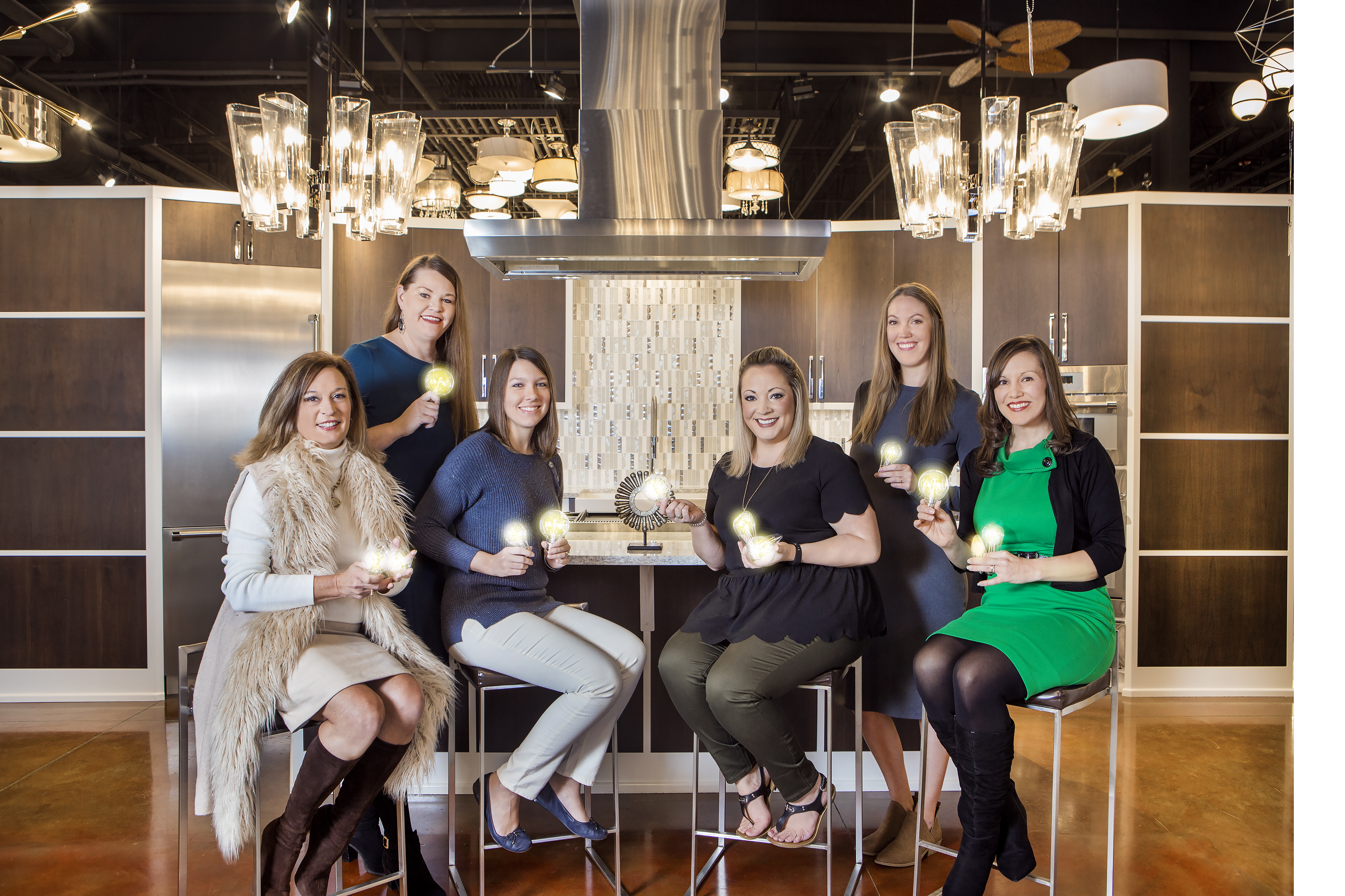 The ladies at Ferguson Bath, Kitchen & Lighting Gallery light up the front of a stunning Thermador kitchen vignette celebrating their big win of Best Lighting Store. Cathi Lunceford, Mallory Wooten, Sarah Stephens, Halley Eargle, Hannah Cooke, and Cassie West, showroom manager.