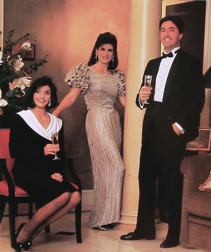 Spring 1991: For the black-tie evening photo shoot, Angel Tollison, sitting, wore a black and white wool crepe dinner suit. Elyse Theodore, standing, selected a slender pleated column with gold embroidered petal sleeves. Both fashions were from Rackes, which was owned by Barbara Rackes. We all still miss her lovely store! Pete Currence wore a classic tuxedo. Photography by Jeff Amberg. 
