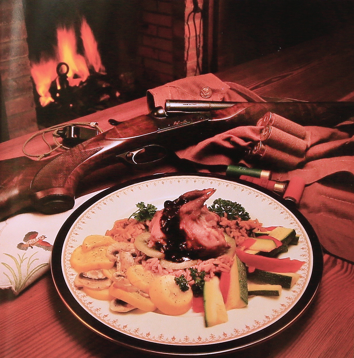 Fall 1991: This Southern cuisine of quail, wild rice, and aromatic assortment of steamed vegetables along with kiwi fruit is set in a classic atmosphere at the Gantt farmhouse. “This shot with the fireplace and shotgun was quite a production,” Jeff Amberg says. “I charged a significant fee for it because I did everything: the planning, the shopping, the cooking, the styling, everything.” 