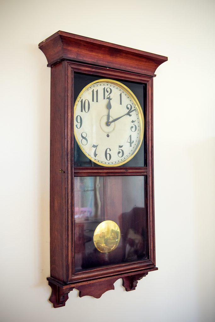 The home is filled with antiques from Jenni’s years of collecting and hunting, as well as family treasures. The old Coca-Cola wall clock, which belonged to Andy’s mother, hangs in the living room. 