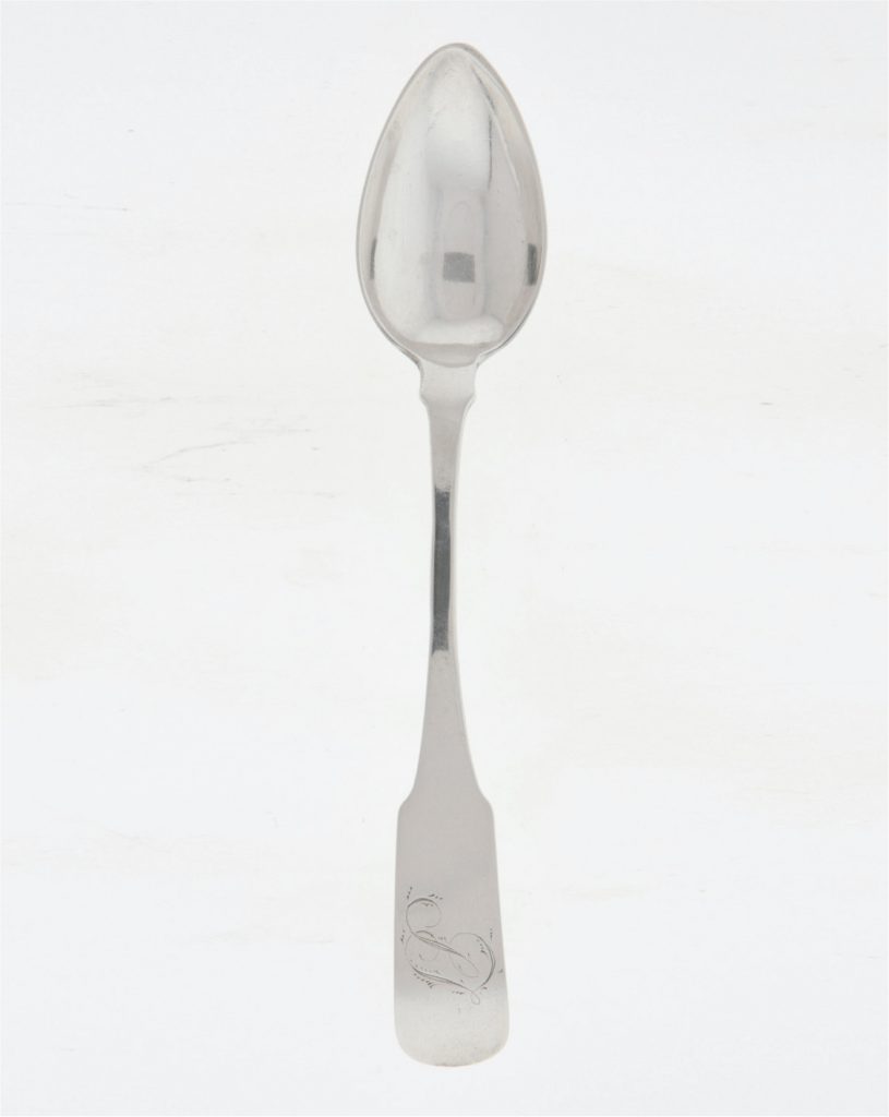 Teaspoon, circa 1844, by William Glaze (silversmith). The shape of the bowl of this spoon suggests it is a citrus spoon, stamped “W Glaze” under the handle and engraved “ST” on the handle. Photography Courtesy of McKissick Museum, University of South Carolina.