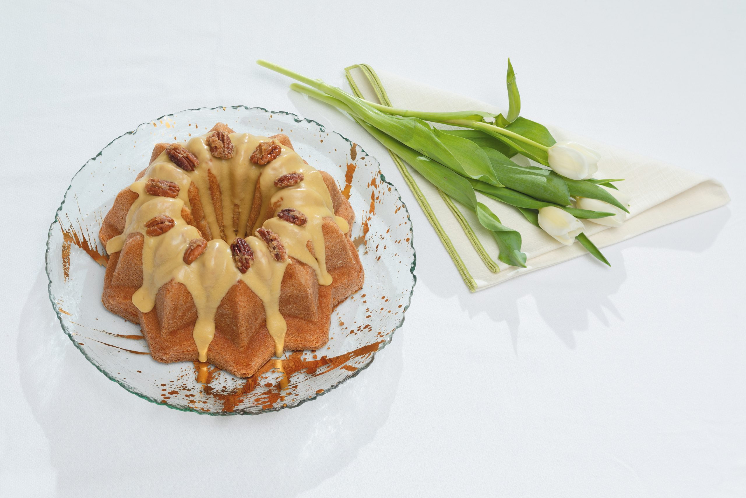 Using dark brown sugar gives this Brown Sugar Cake, also called Ed’s Favorite Pound Cake, additional moisture and character. Courtesy of non(e)such: Annieglass plate with Swing napkins in Natural/Lime.