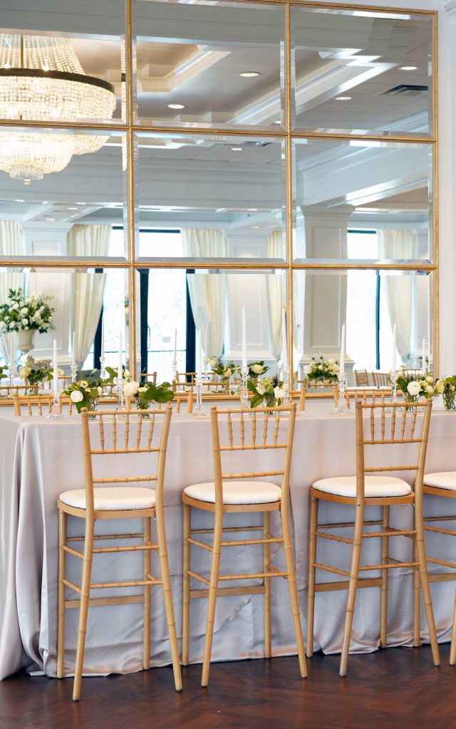  Wedding planner and floral designer Julianne Sojourner helped create a beautiful and memorable backdrop for the weekend of festivities using all white flowers and family heirlooms. 