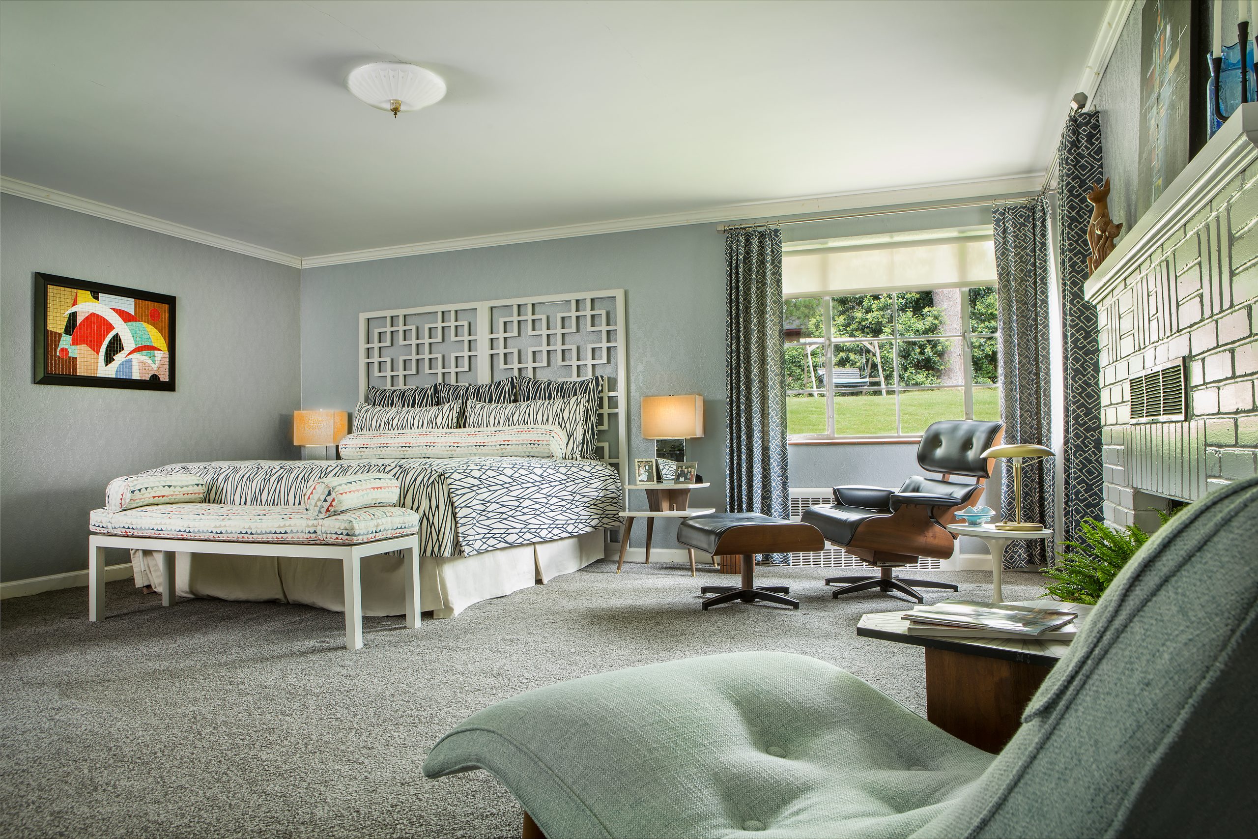 The master bedroom is highlighted by a wall mosaic made by John’s father, John Scullion, Sr., in 1965. A gifted artist and master woodworker, he was a major influence on John’s love for midcentury modern.