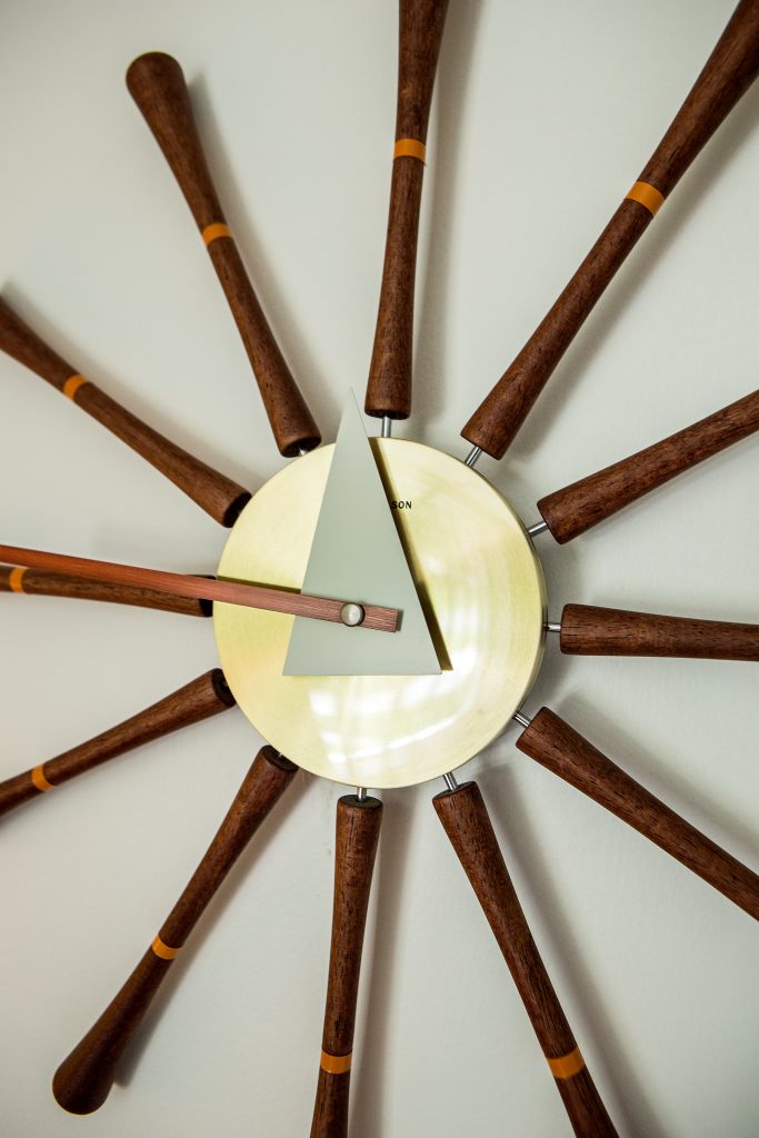 The wall clock was designed by George Nelson, a late American Industrial designer who is considered to be a founder of 20th century modernist design.