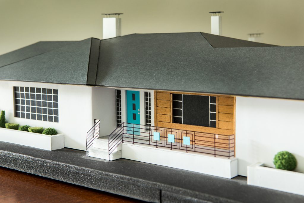 The Scullions’ son John, who is currently studying architecture at Dalhousie University in Nova Scotia, made the scale model of the home. Colorado artist Christian Musselman provided advice, and they collaborated to add the carport addition.