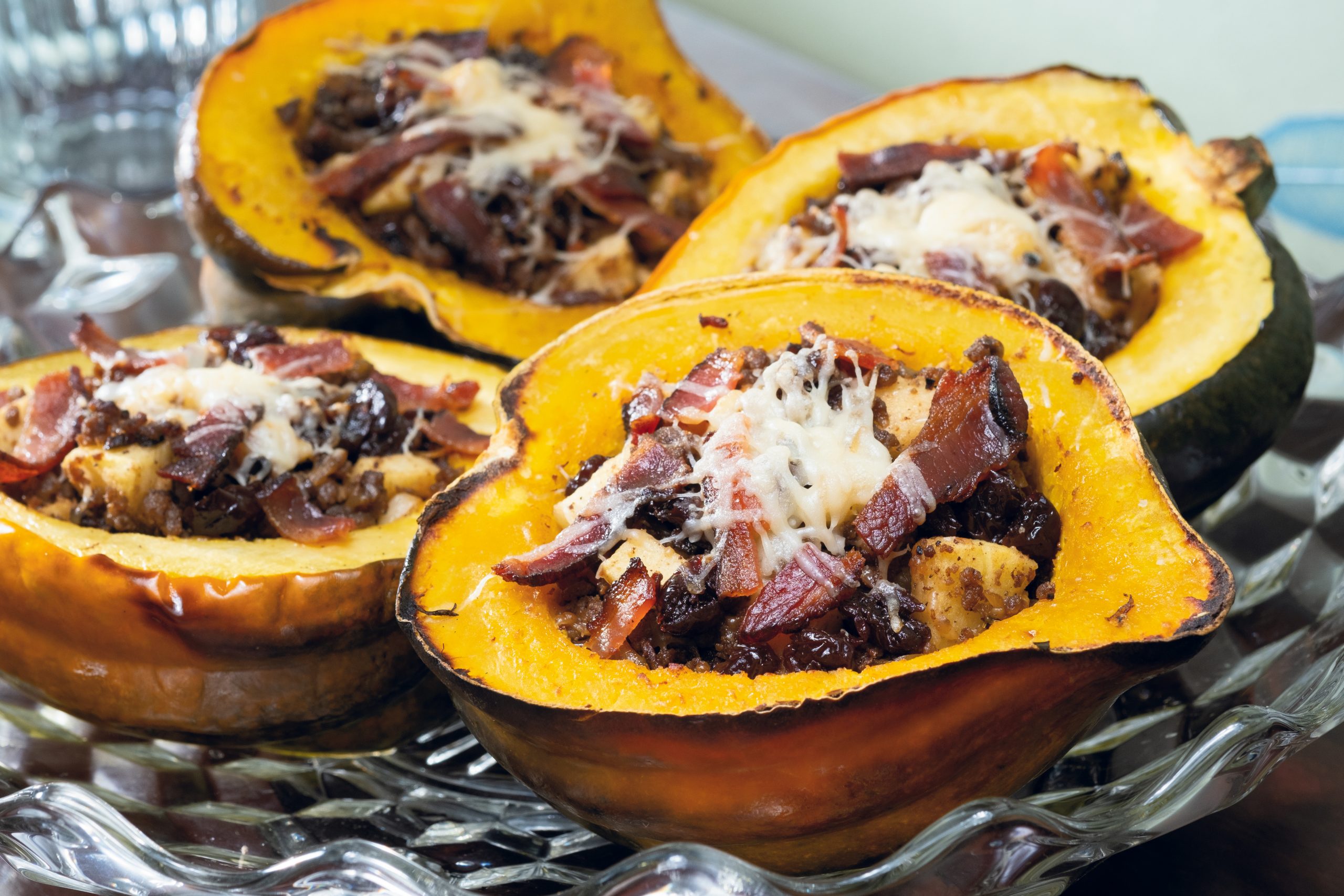 Stuffed acorn squash provides the opportunity for each individual to enjoy a delicious dish. Fillings can be varied depending on what is in the larder. Enhance the flavors by melting grated cheese on top! 