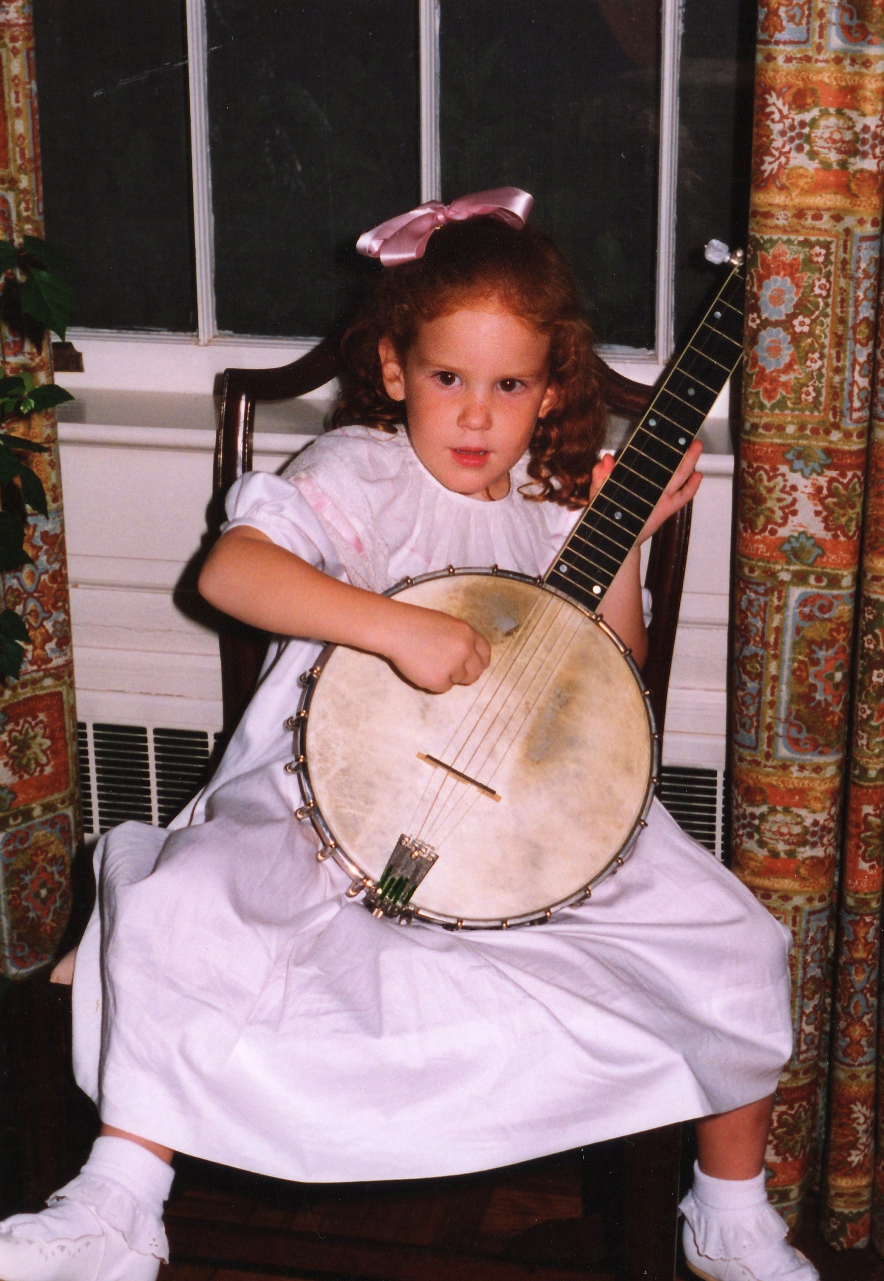 Margaret Clay learning the banjo at age 5.