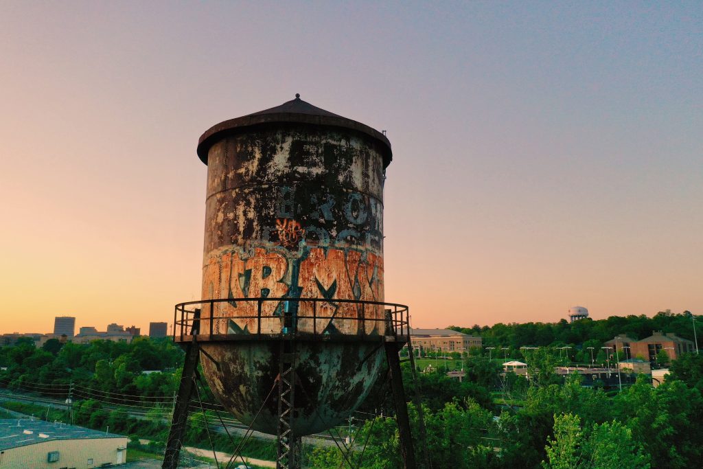 An abandoned water tower on Assembly Street now serves as a rusty canvas in the sky for graffiti artists. 