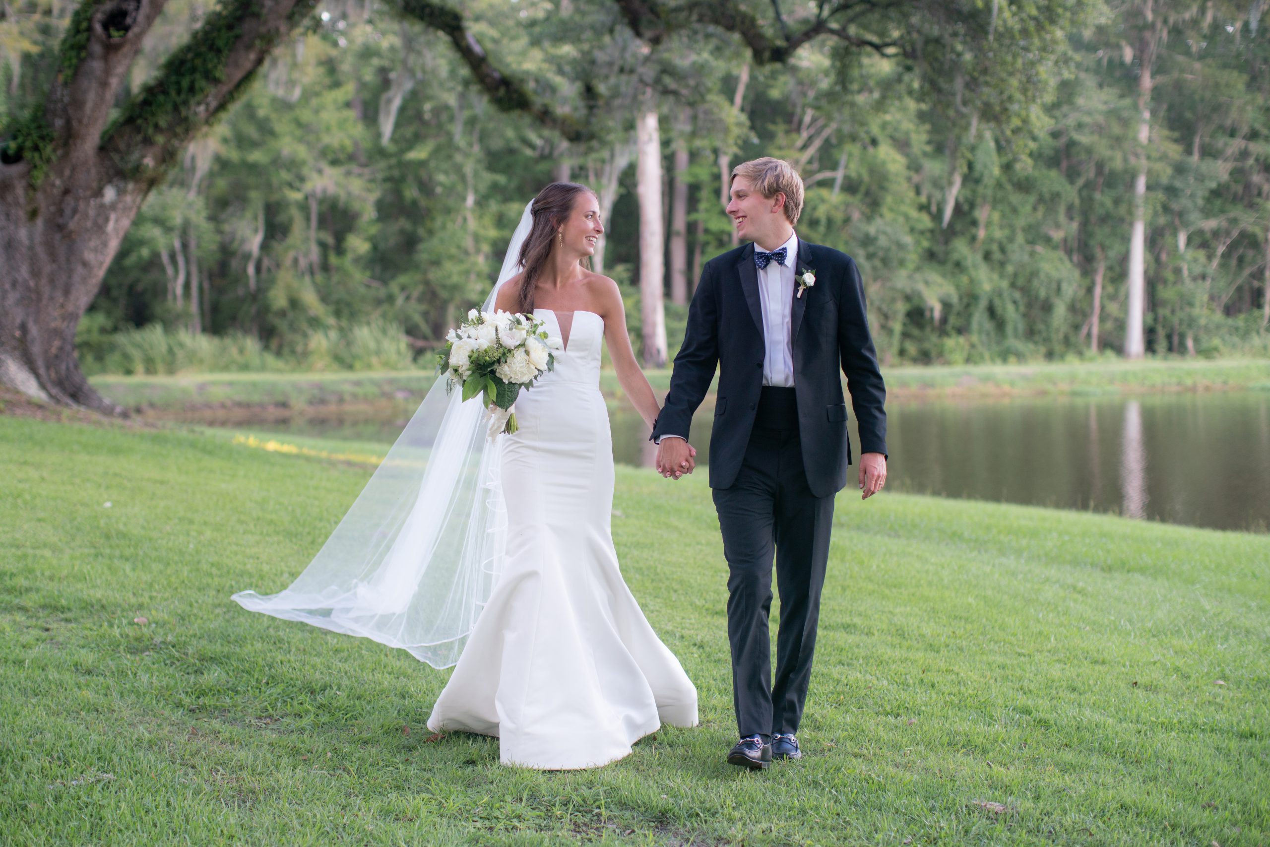 Emmy Ragsdale and Davis Kirby met through mutual friends their freshman year of college at the University of South Carolina. The couple was married Aug. 8 at Prince George Winyah Church in Georgetown with an outdoor reception at the Ragsdales’ country property on the banks of the Great Pee Dee River.