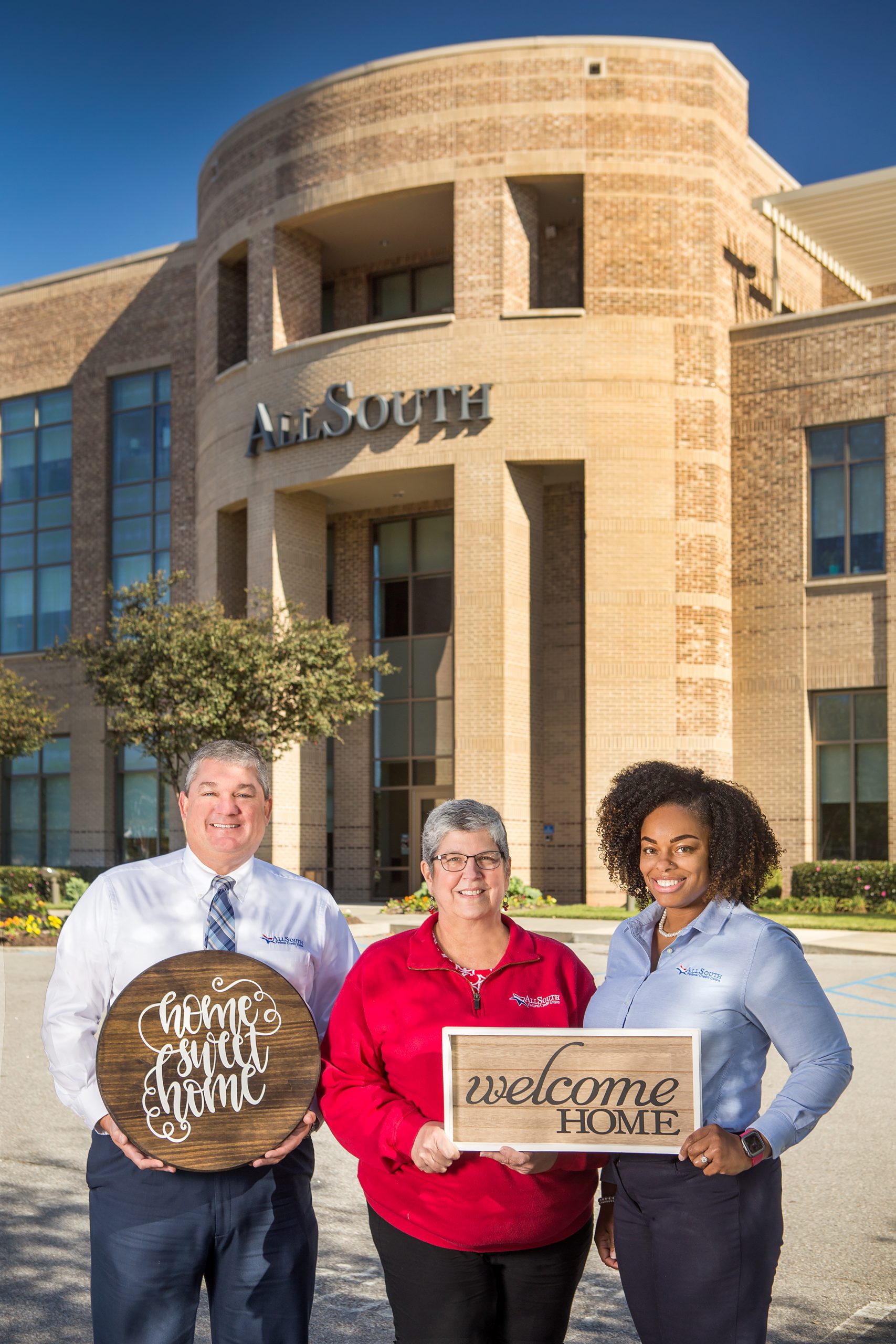 Bryce Boyd, Diane Werner, and Jessica Weeks at AllSouth Federal Credit Union, voted Best Mortgage Bank, are happy to be home for your mortgage. 