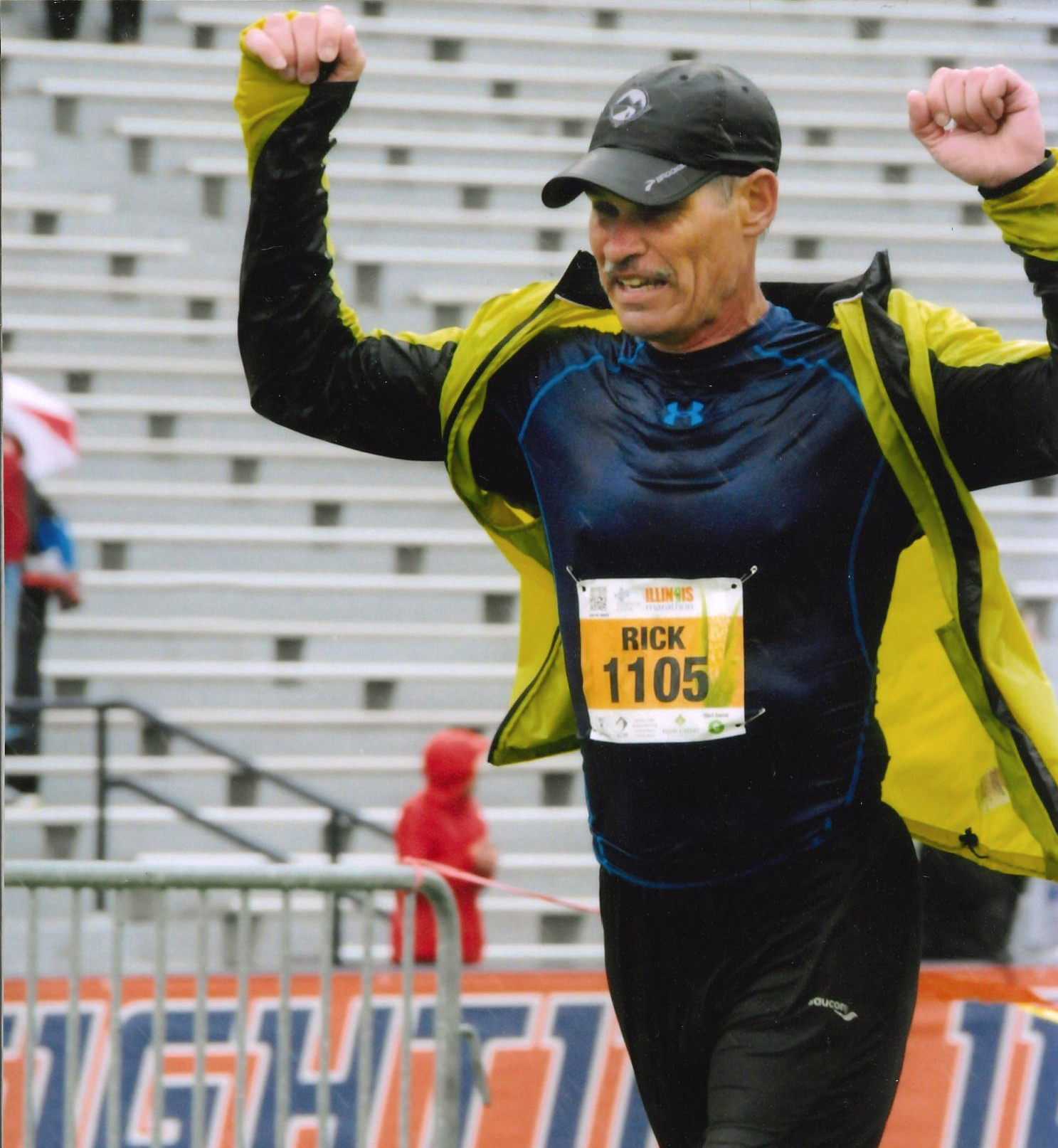 Rick Gibbons at the Illinois Marathon finish line on the football field at the University of Illinois, April 2016.
