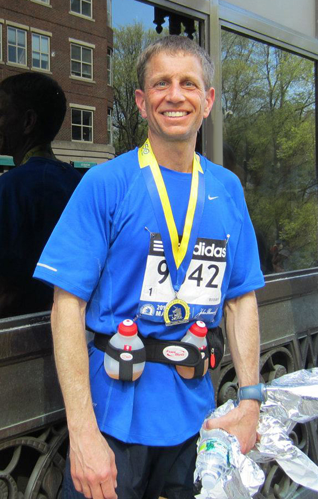 Mark Stout smiles after finishing the Boston Marathon, a highlight of the 15 he has now completed. 