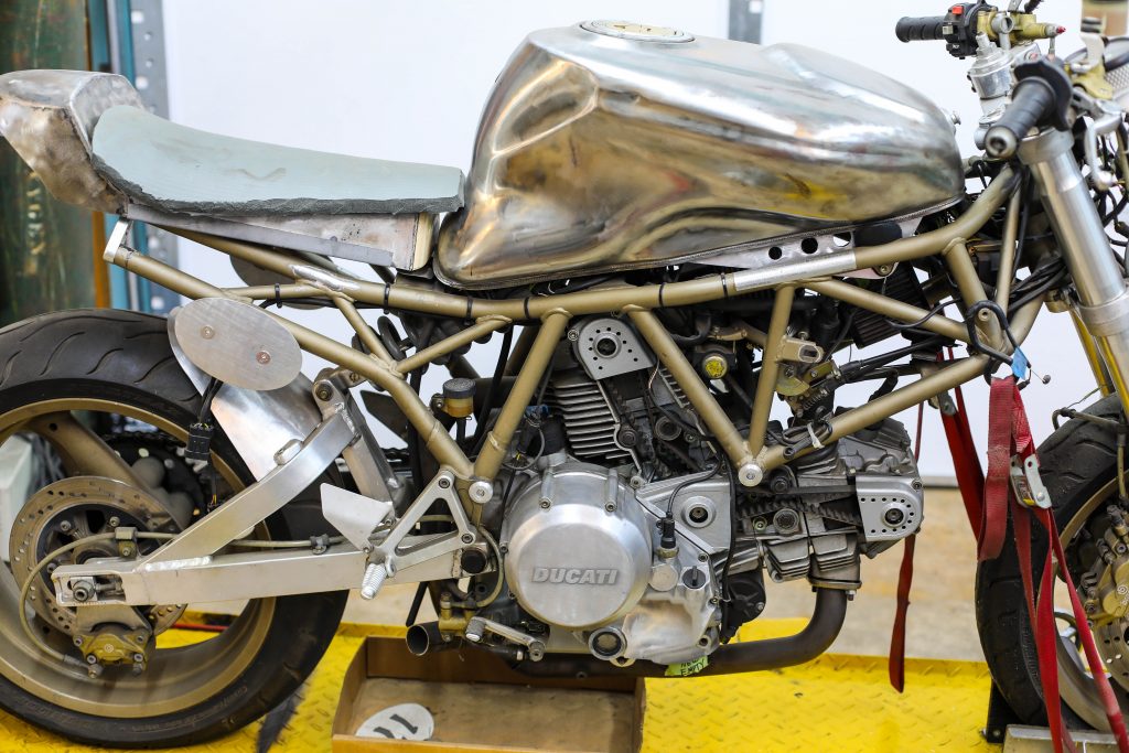 An Italian Ducati is being refurbished inside Clark Ellefson’s art studio. 
