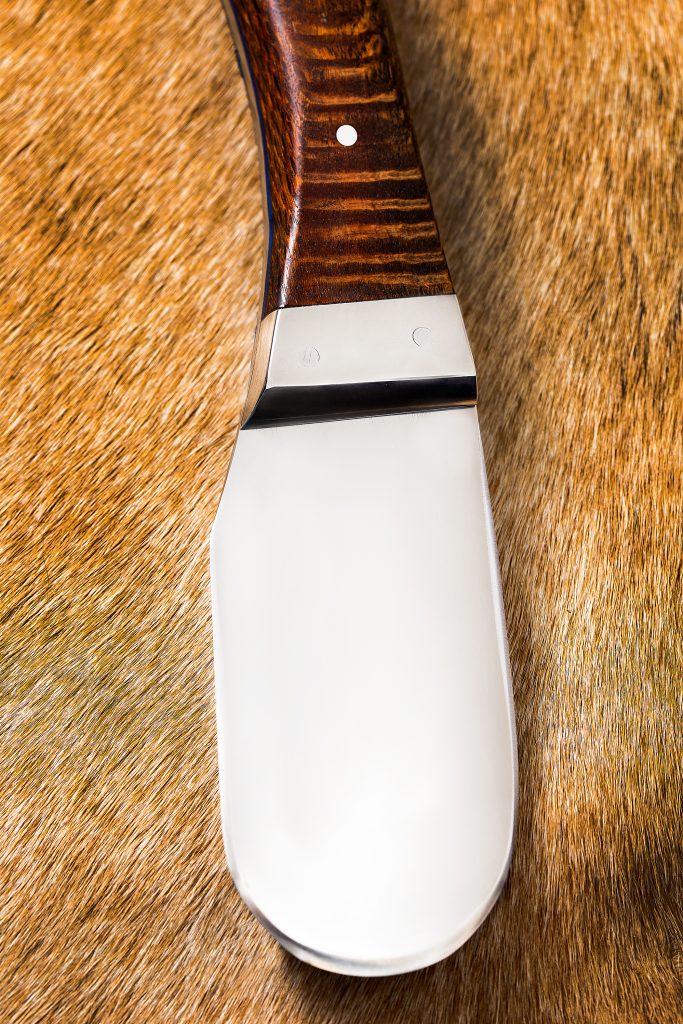 A specialty knife for skinning large game, the paddle shaped skinner is sharpened on all sides. 