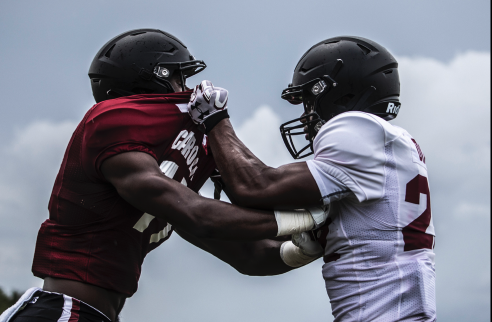 Two Gamecocks face off during a spring practice contact drill. Photography by Abigail Green
