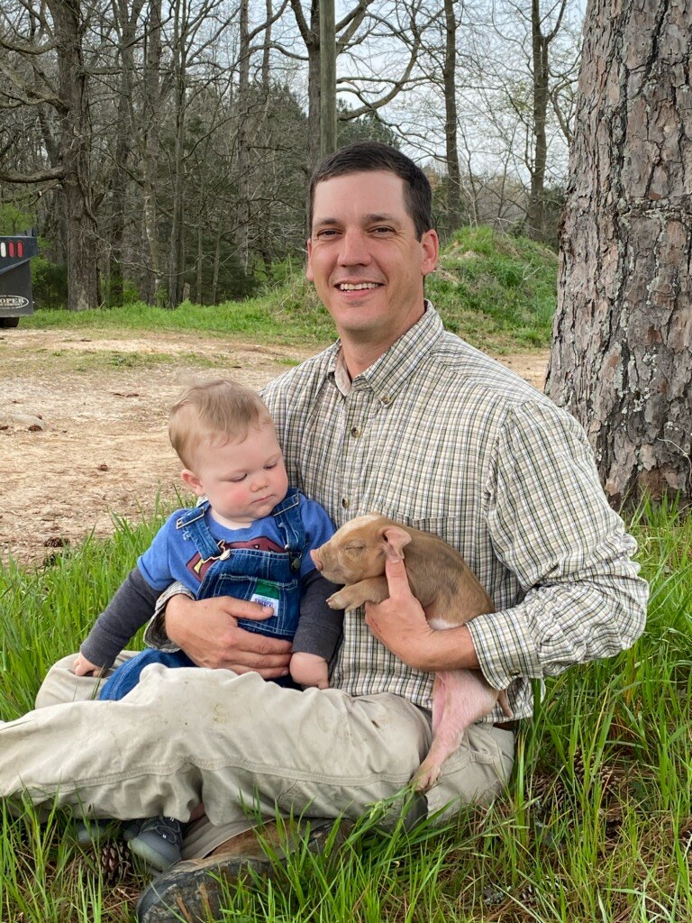 Matt Loignon owns Persimmon Hill Farms, located in Newberry County, which sells eggs, chicken, pork, and beef products — all from pasture-raised and antibiotic-free animals. Matt developed a taste for the land in his early years that stayed with him, eventually leading him to full-time farming after serving in Iraq and Afghanistan as a U.S. Marine. Matt raises his own piglets and his son, Paul, will have the privilege of growing up on the family farm!