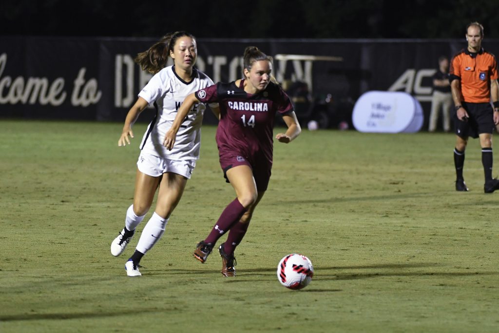 Brianna Behm beats her defender during a win at Wake Forest.
