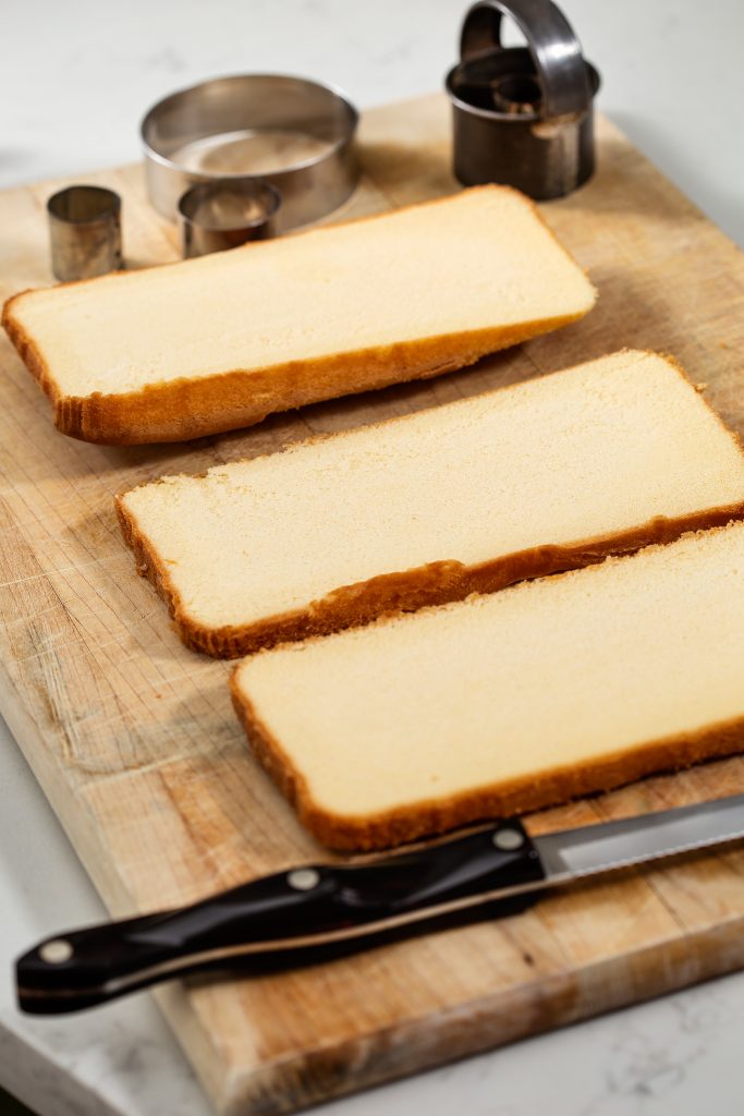 3. Slice the cake into ¾ inch slices. Freezing it first makes the task easier.