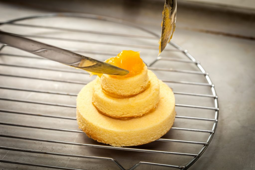 7: The top layer can be filled with something delicious — like whipped cream, lemon curd, raspberry or peach jam. 