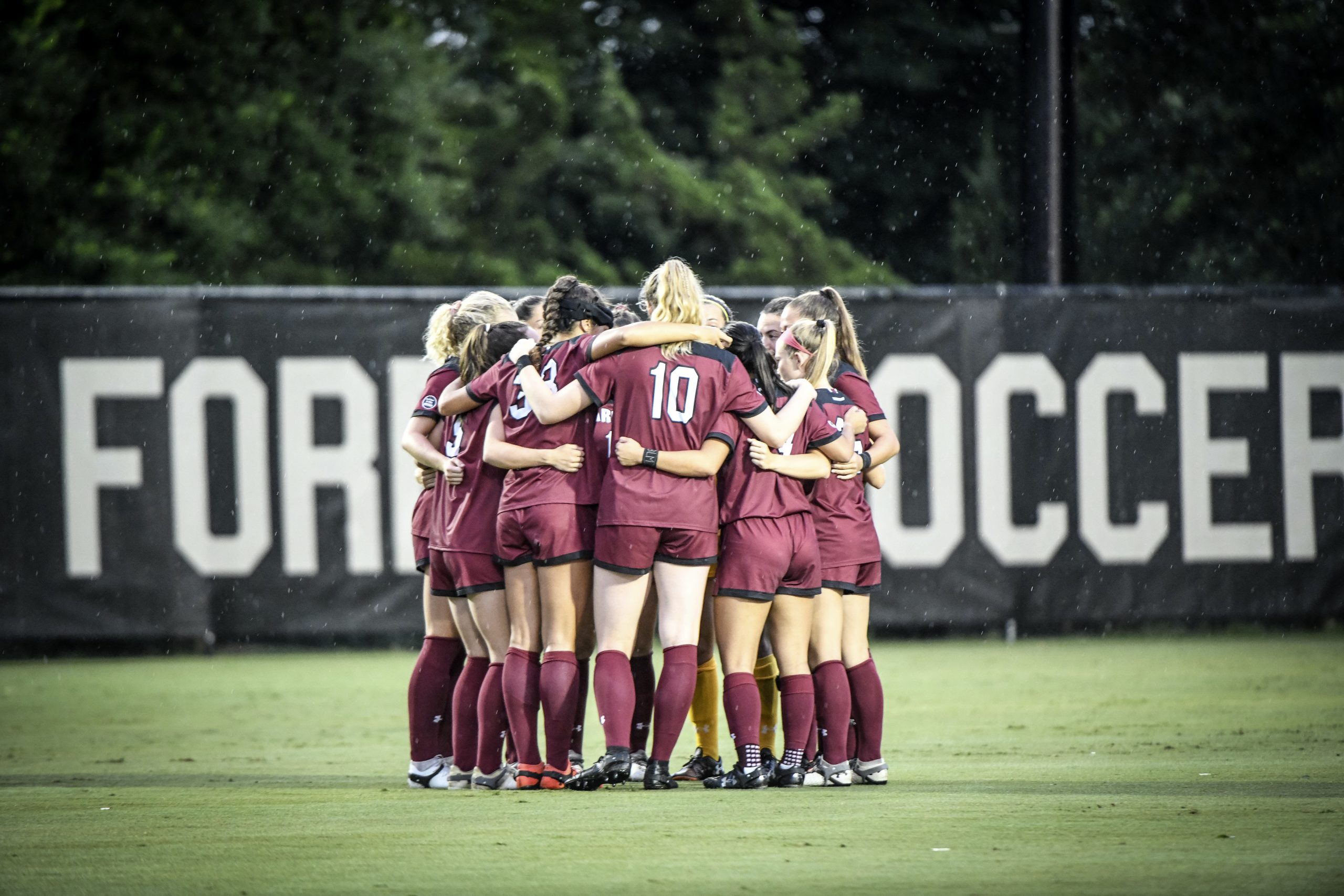 The USC women’s soccer starting lineup for 2021 huddles before their win Aug. 12 at Wake Forest. Heather Hinz, Luciana Zullo, Camryn Dixon, Catherine Barry, Abby Hugo, Ryan Gareis, Samantha Chang, Lauren Chang, Claire Griffiths, Jyllissa Harris, Sarah Eskew