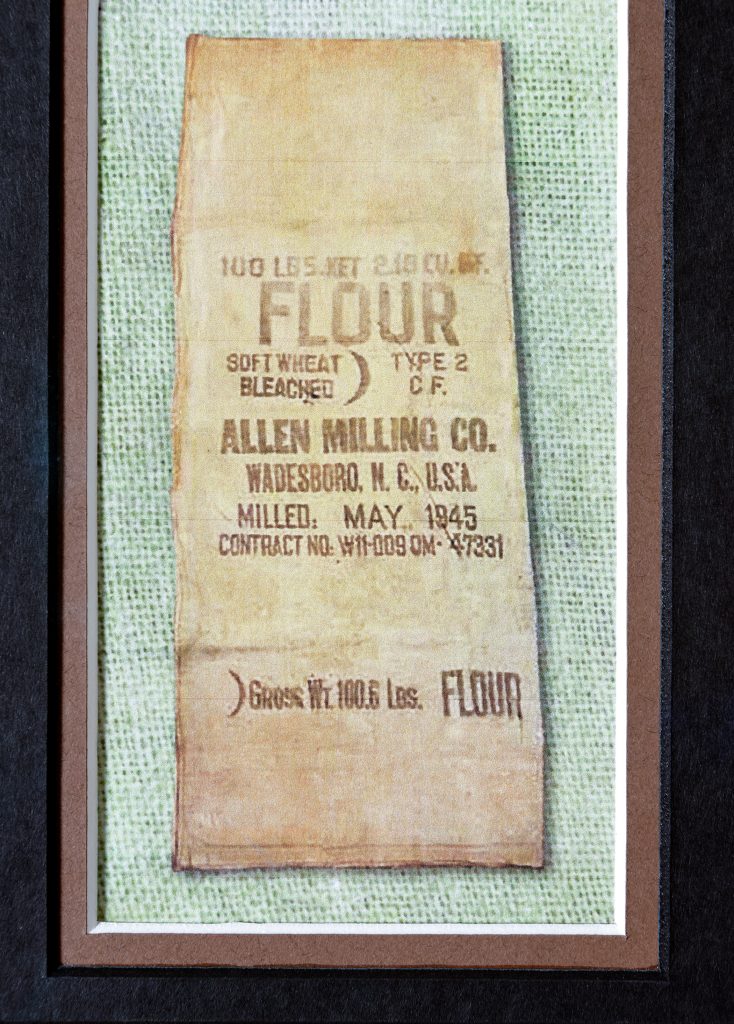 Old cloth flour sack, a replica of sacks donated and shipped by Allen Milling Company and airdropped to the Dutch in Amsterdam to provide food and clothing in the aftermath of World War II.