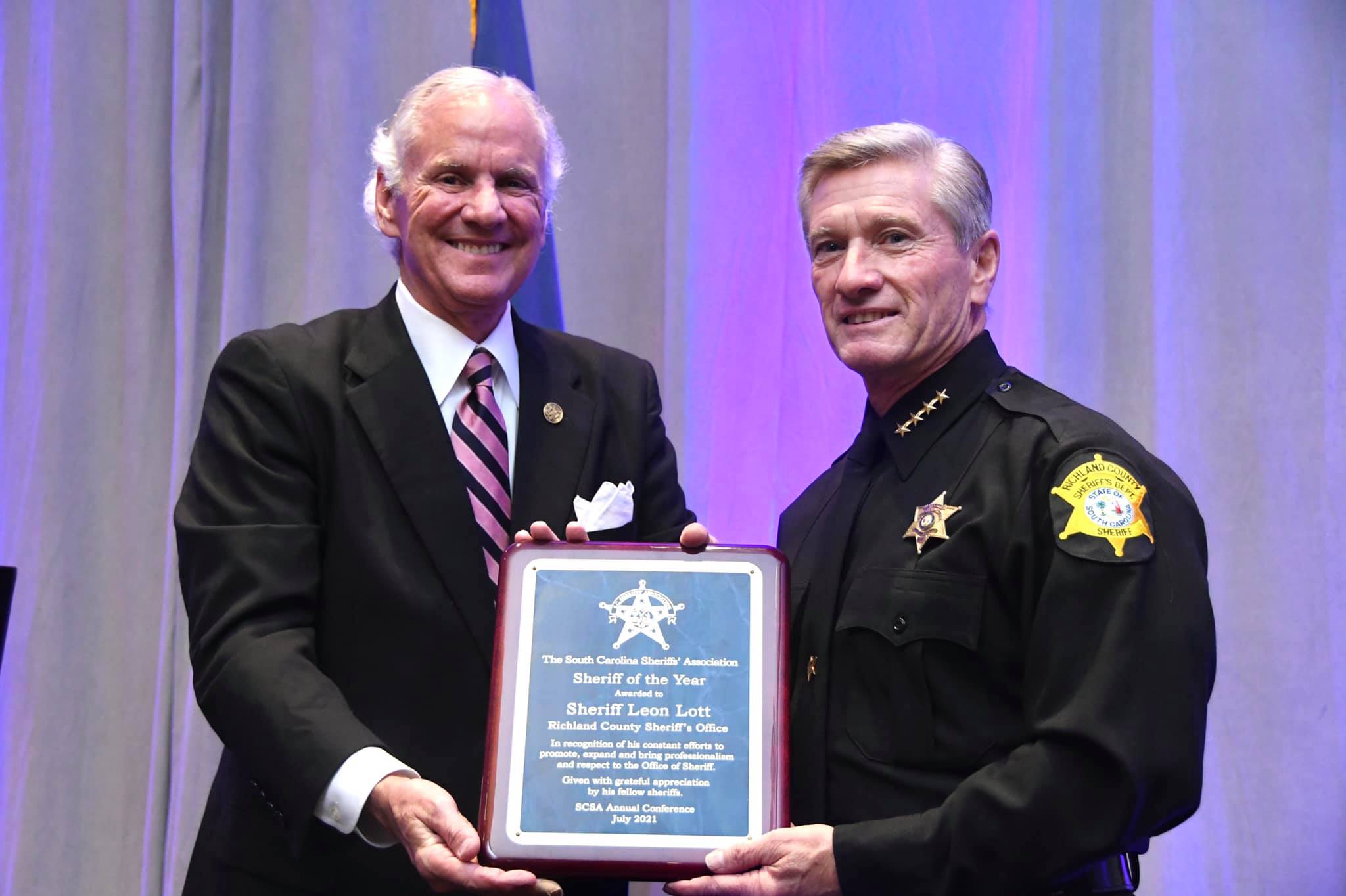Gov. Henry McMaster presents Sheriff Leon Lott the S.C. Sheriff of the Year award, July 12, 2021, in Myrtle Beach. Photo courtesy of RCSD
