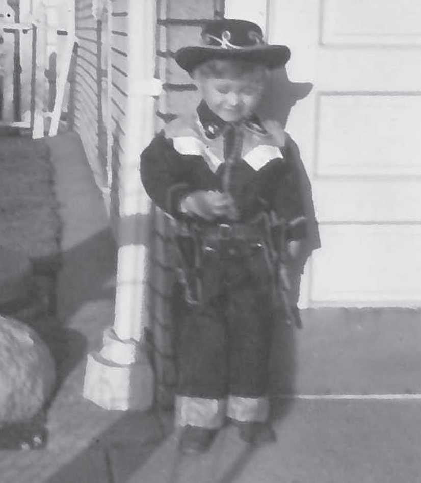  Leon Lott as a small boy in Aiken preparing for his future career as a sheriff. 