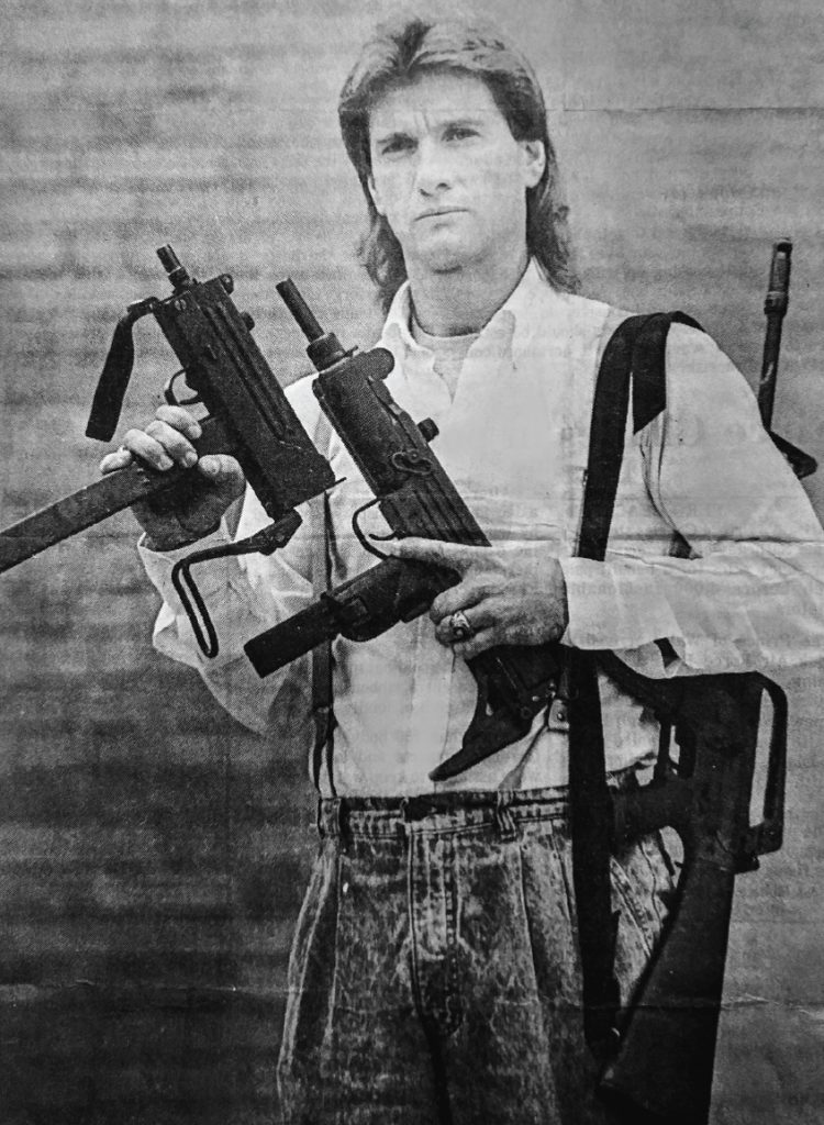  Narcotics officer Leon Lott with seized weapons — a MAC-10, an Uzi, and an M-16 in the early 1980s. Photo courtesy of RCSD