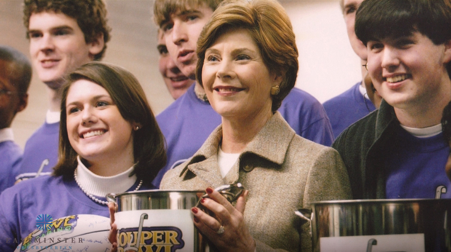 The Souper Bowl of Caring catches the eye of the White House. Former First Lady Laura Bush stands with Souper Bowl of Caring Youth.