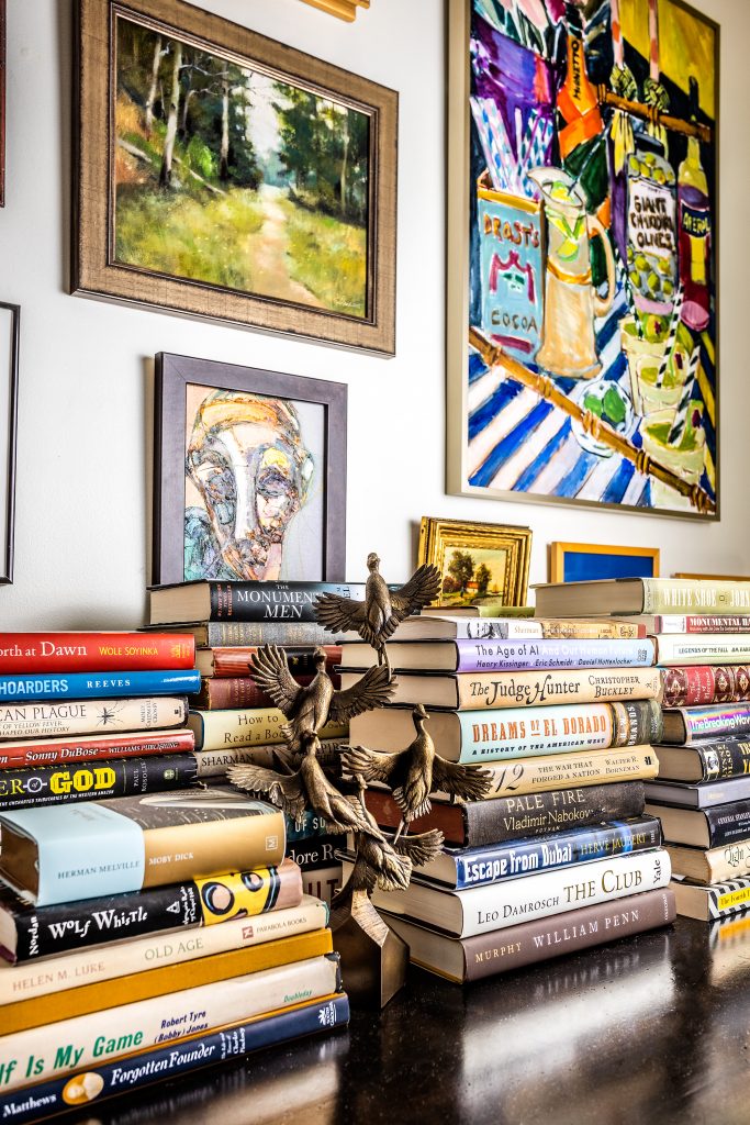“We have to cull our books all the time because my husband and I both read a lot; they are all over the house,” Karen says. Stacks of books adorn almost every room; their colorful jackets add a layer of visual interest to the home’s decor and are ready to be picked up and consulted at any moment.