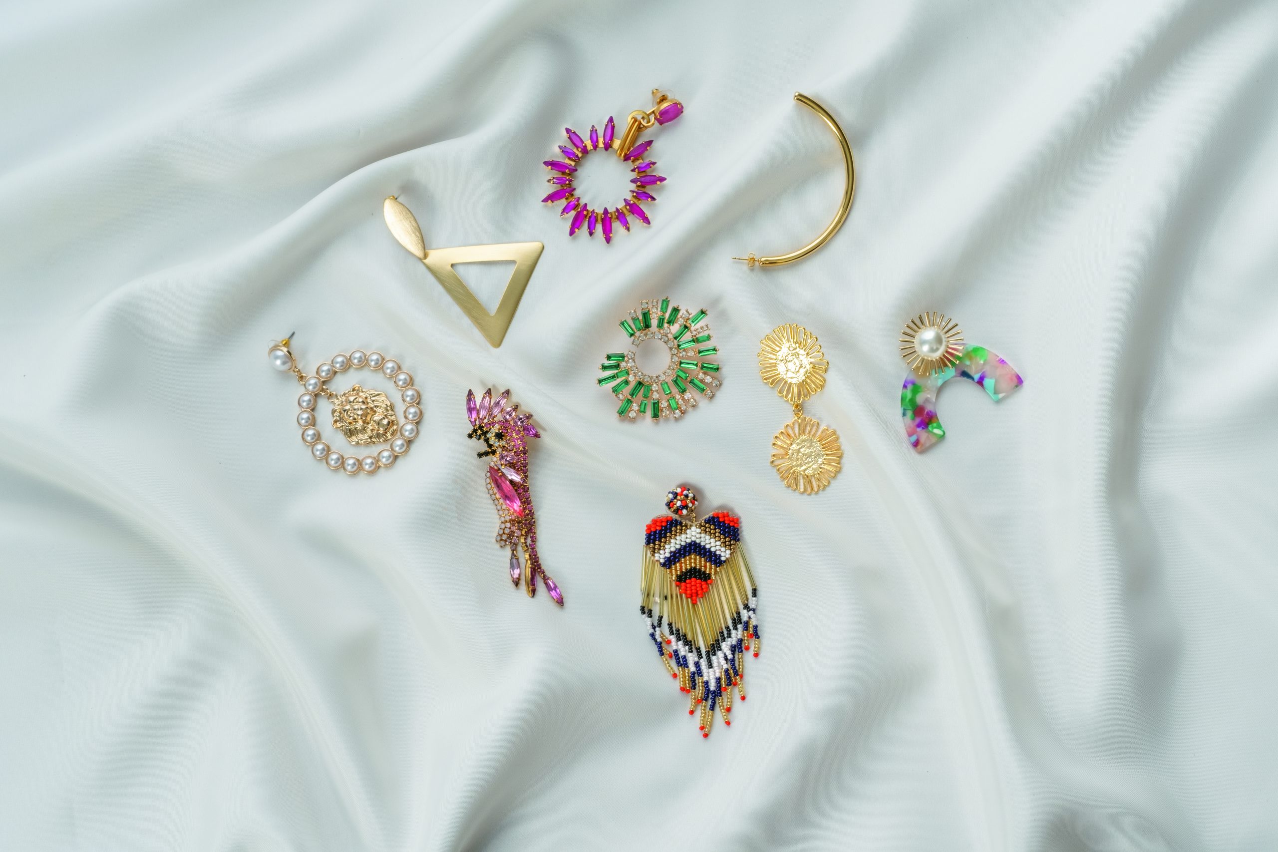 Assorted earrings from Revente, Mainstream Boutique, and The Blake. 