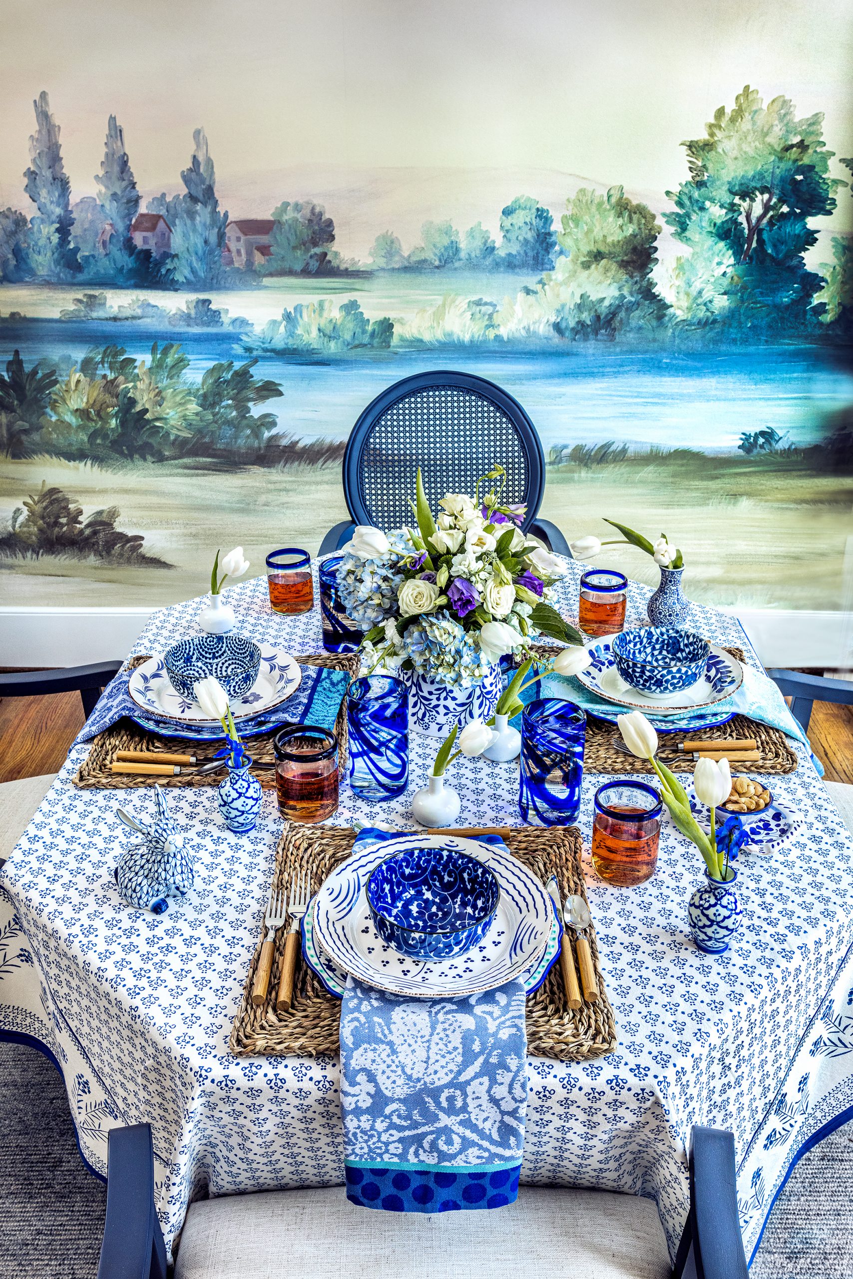 Creating a tablescape with accents of blue and white is both fresh and timeless. It is a great way to mix traditional patterns with modern influences. Cobalt blue can be classical and bold in china, glassware, and fabrics. The original source of blue for fabric is the tropically grown indigo plant, which is very labor intensive and expensive to produce. South Carolina was briefly a major producer of indigo dye. 